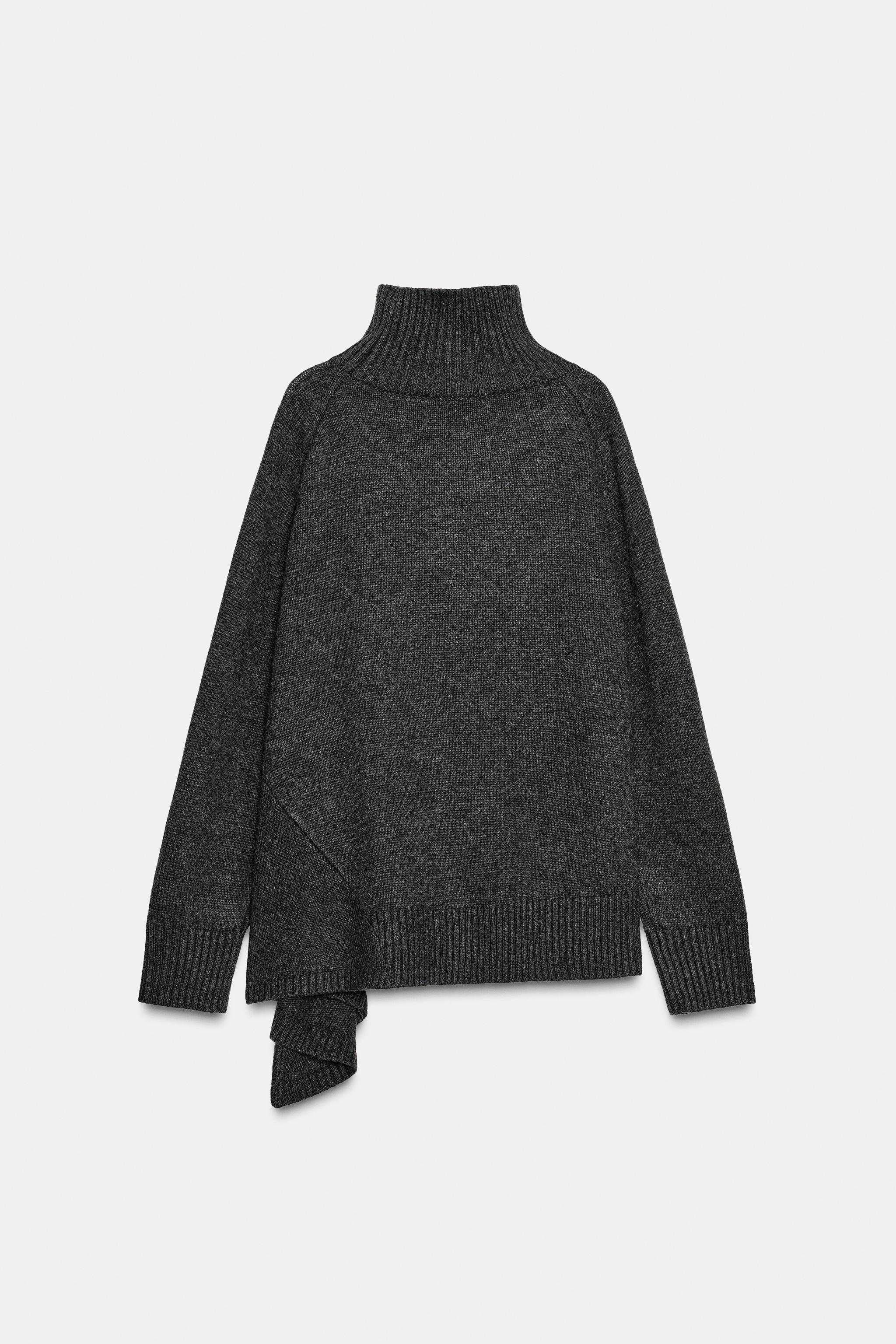 PULL AVEC LAINE ET OURLET ASYMÉTRIQUE
