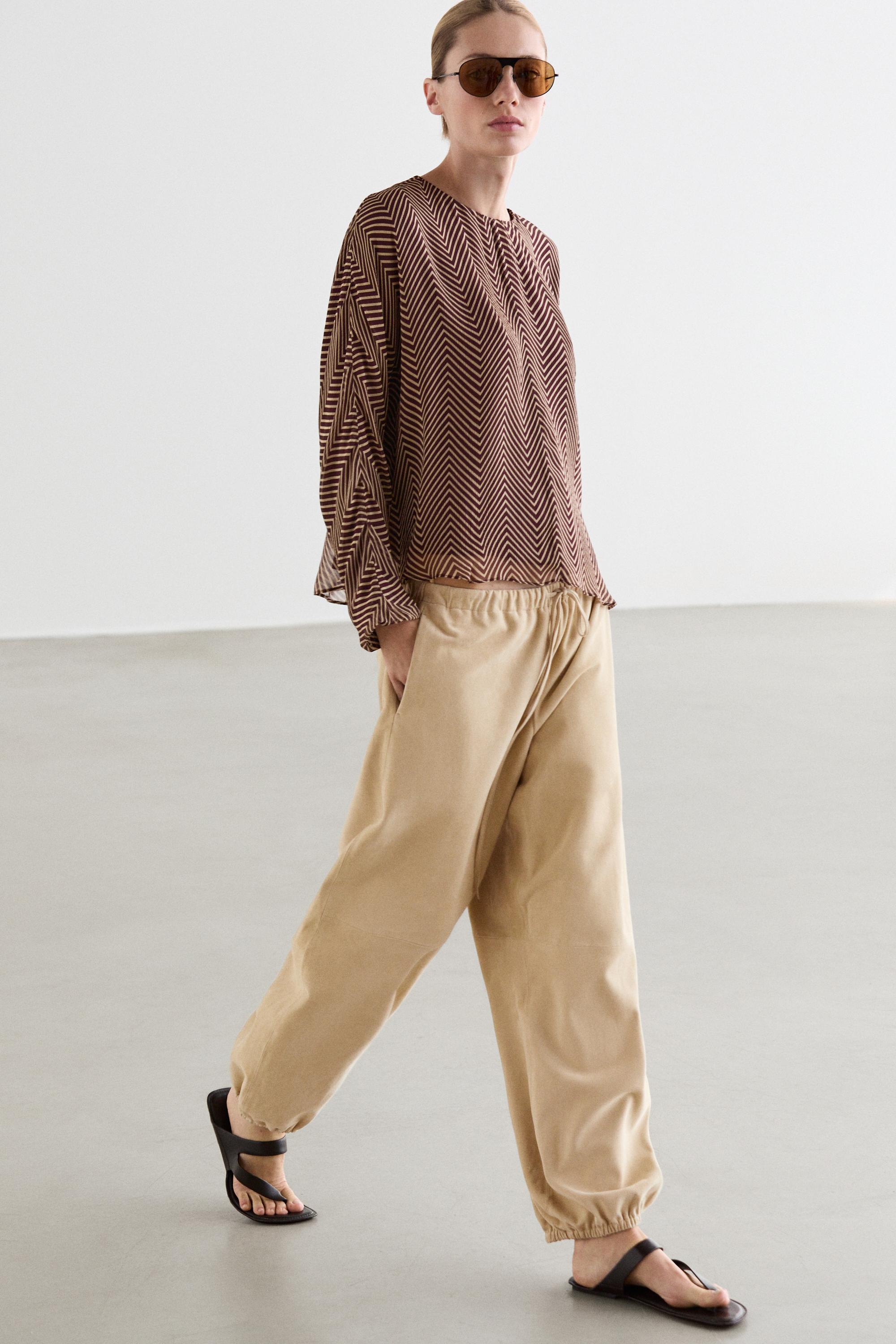 Flowing geometric print blouse