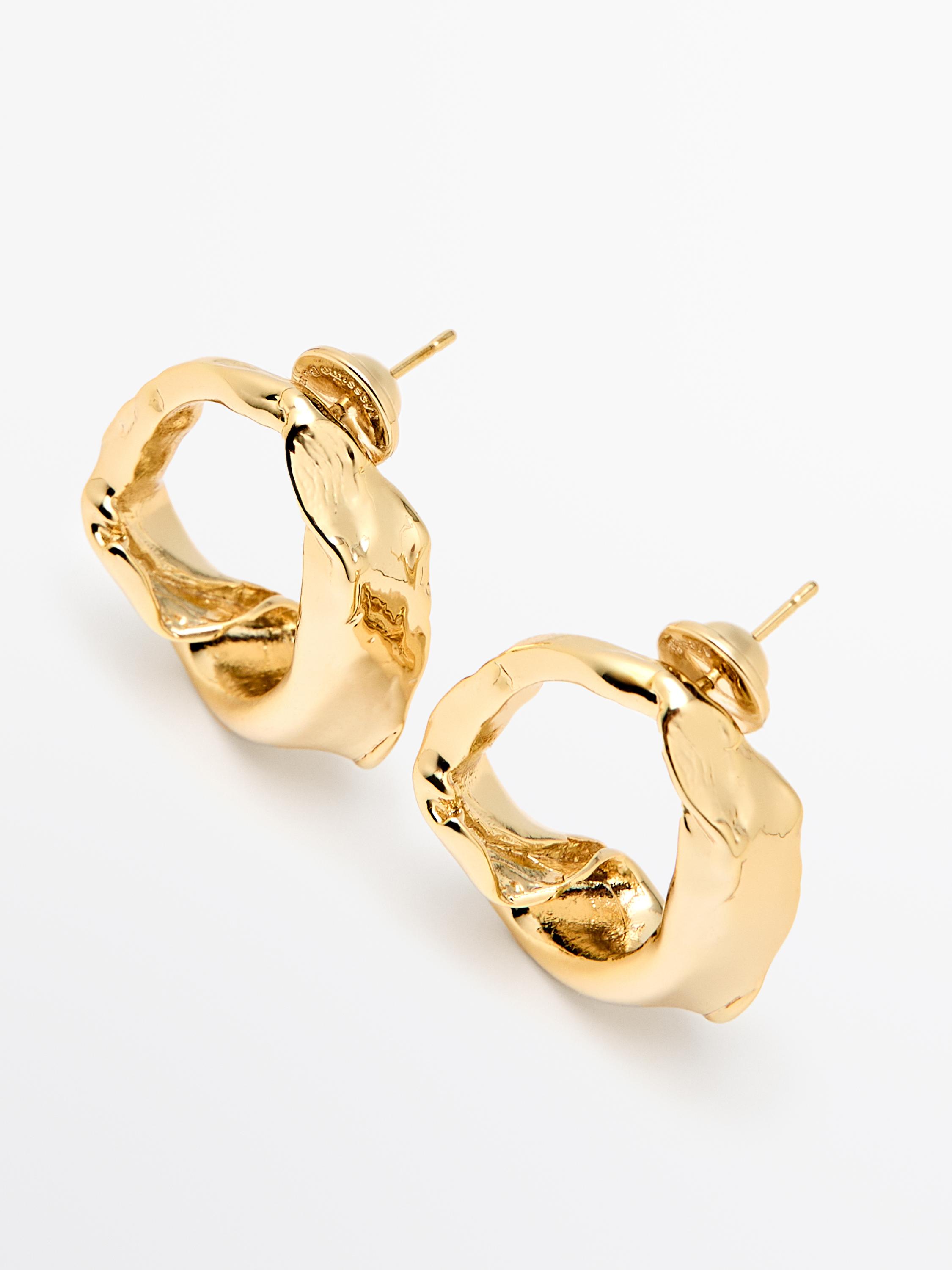 Boucles d'oreilles irrégulières