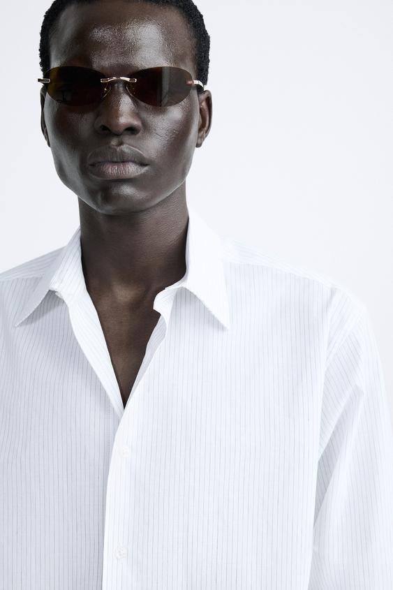 Ruffle-Sleeve Blouse