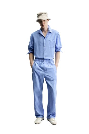 قميص مخطط بجيوب - 981 الخاص بـ Zara