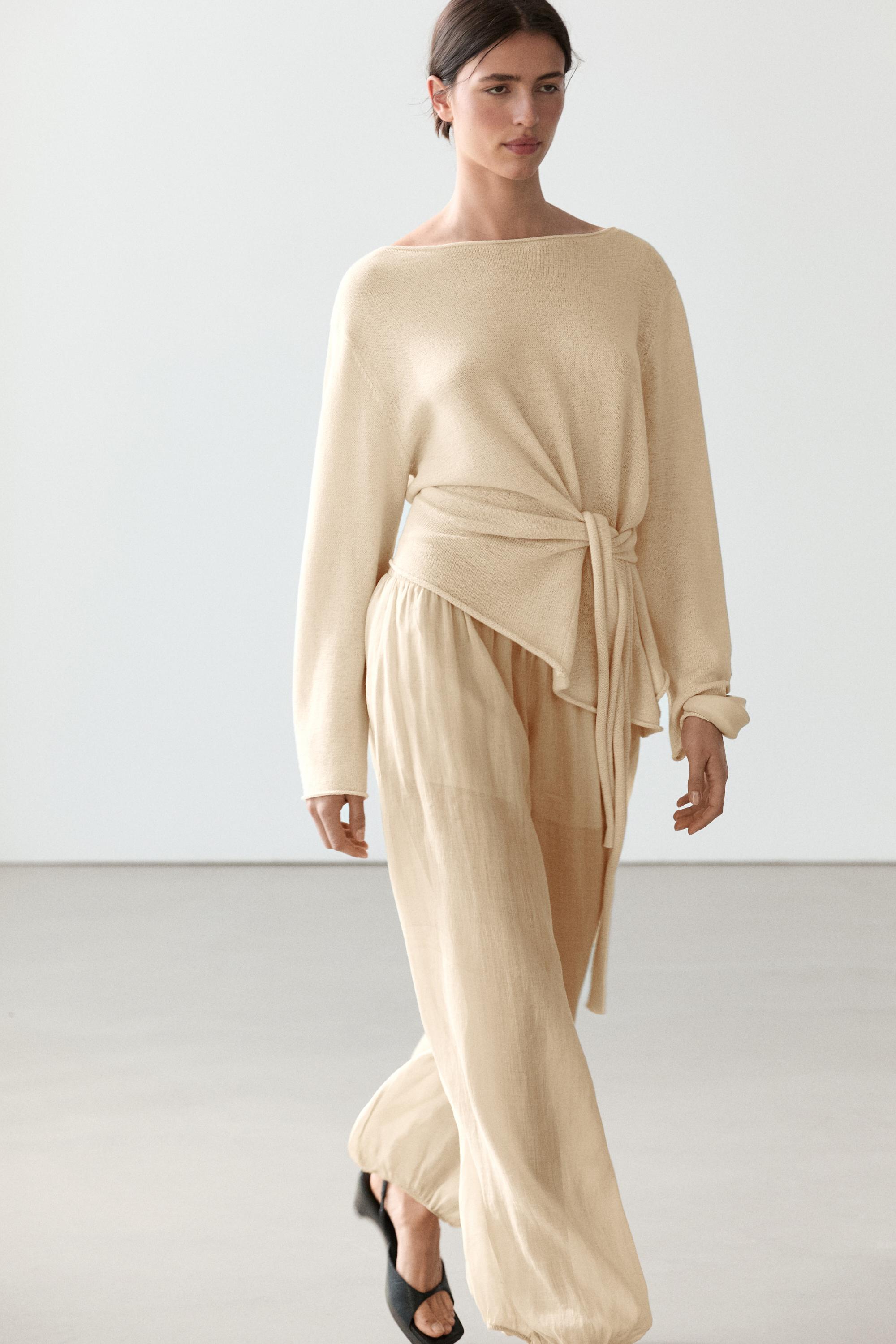 Asymmetric linen blend sweater with tie detail