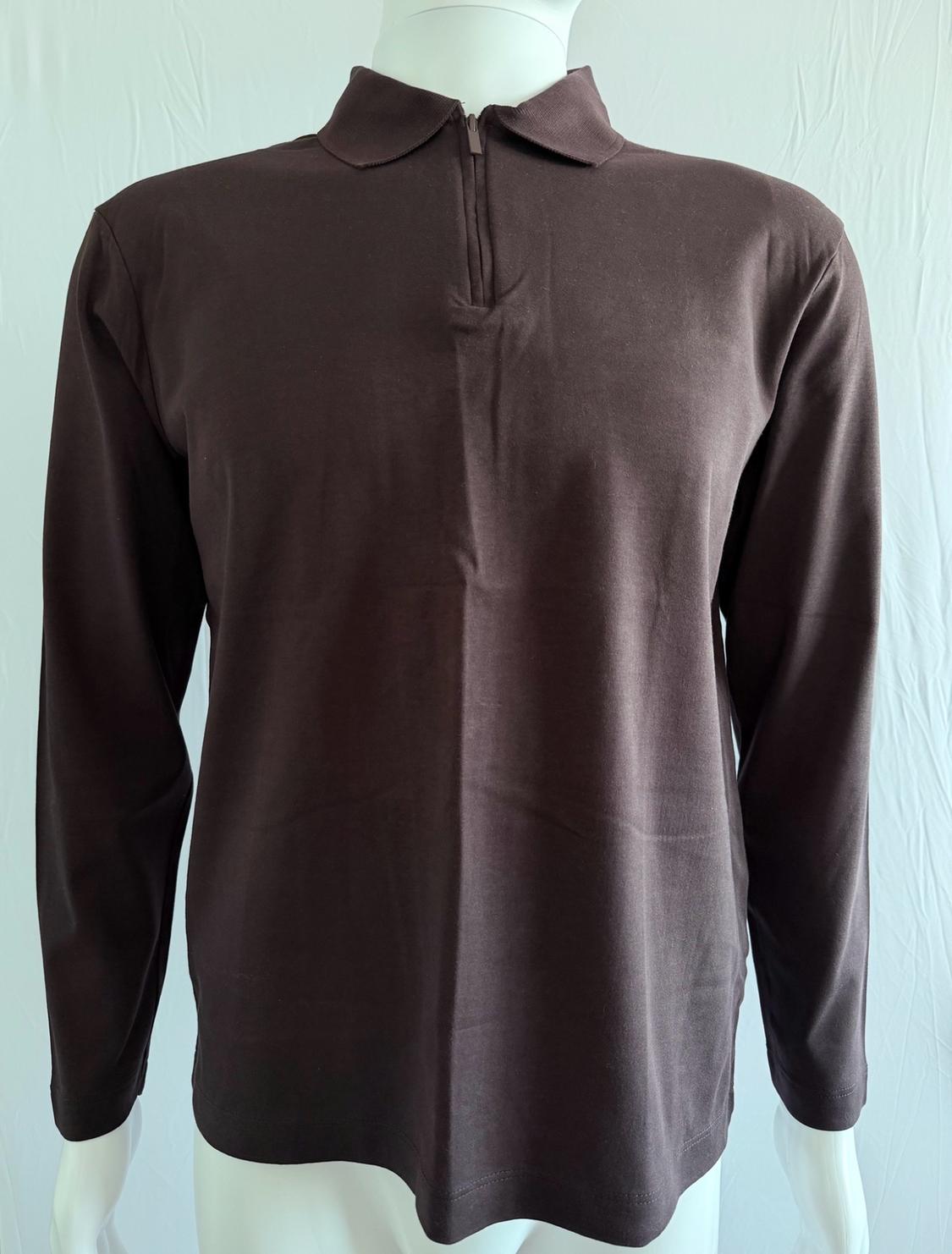 Mannequin wearing a long-sleeved dark brown polo shirt with a collar and a half-front zipper, against a white fabric background.
