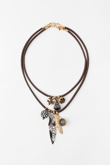 BALENĺ 2 ŠŇŮDKOVÝCH NÁHRDELNĺKŮ S PŘĺZNAKY - Golden by Zara