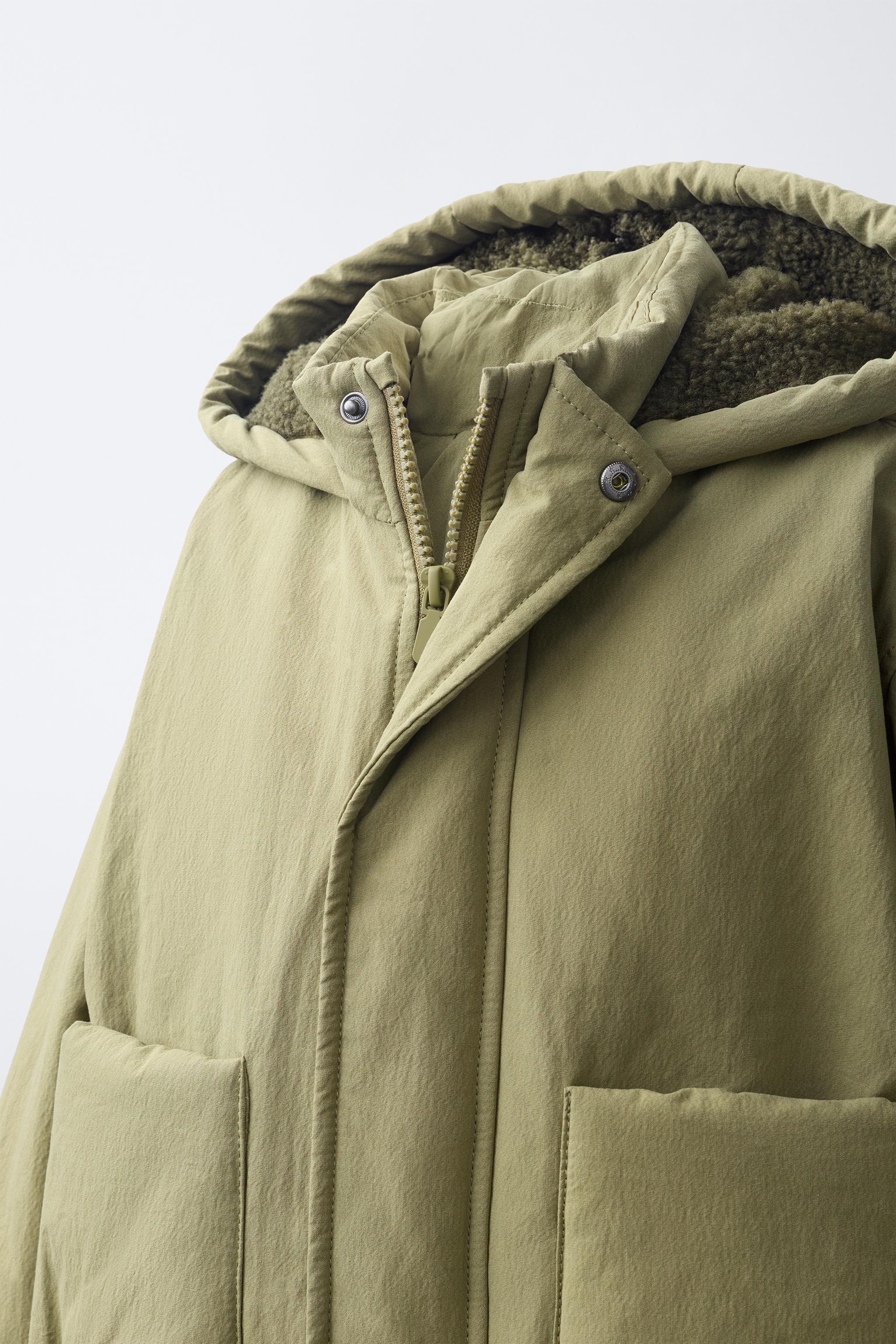 BLOUSON À CAPUCHE EFFET MOUTON