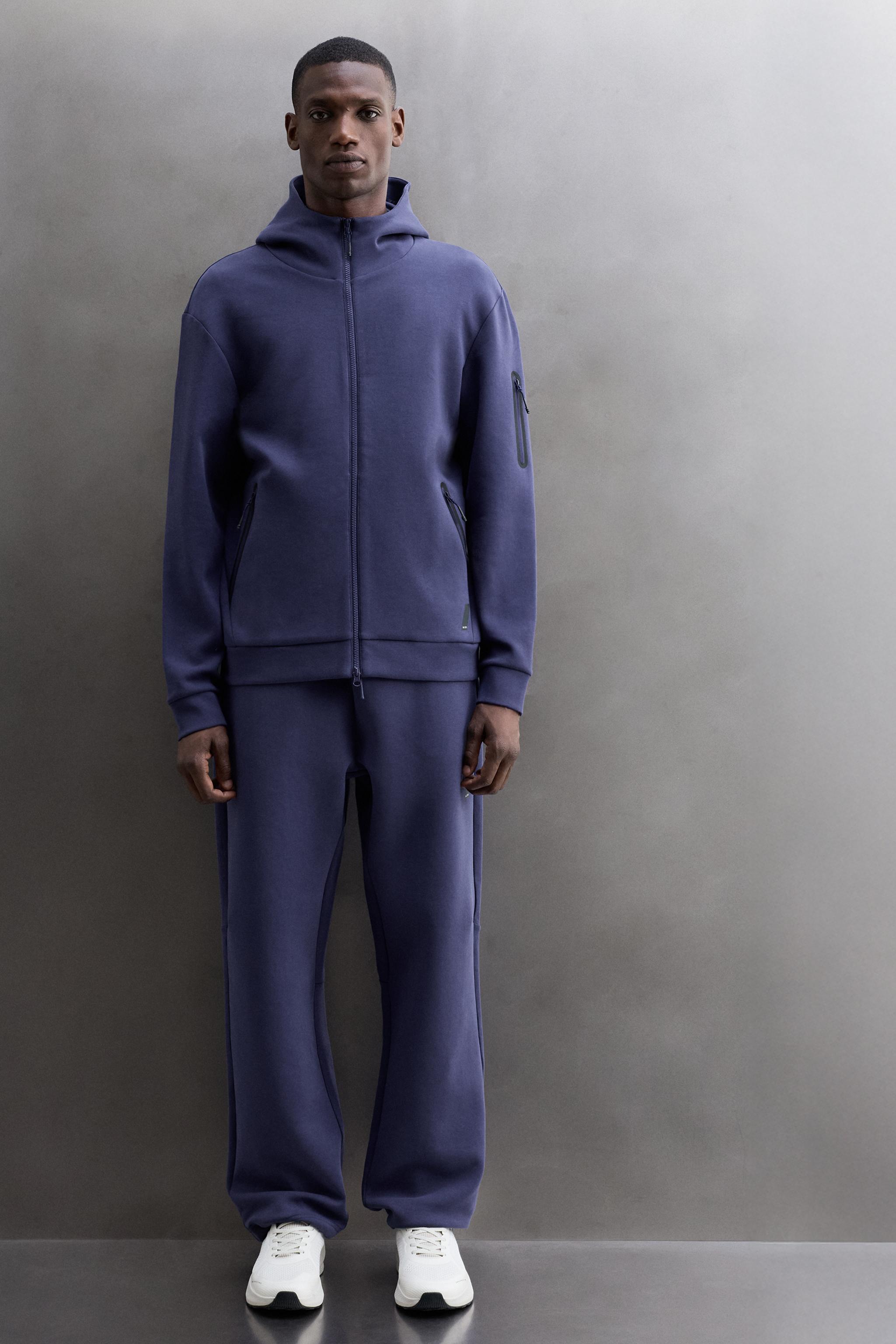 SWEAT-SHIRT TECHNIQUE ZIPPÉ À CAPUCHE