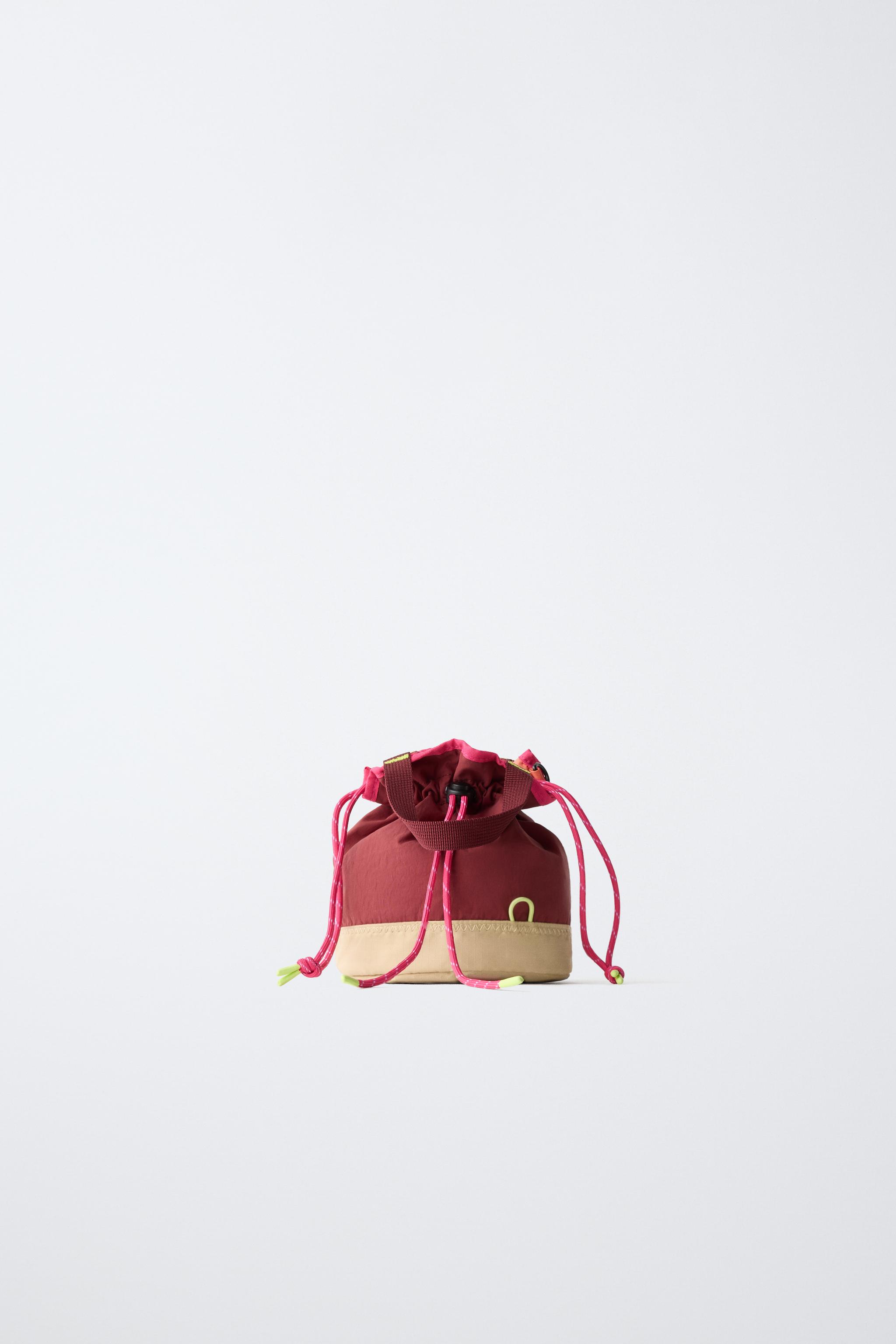 MULTICOLOR TECHNICAL BUCKET BAG