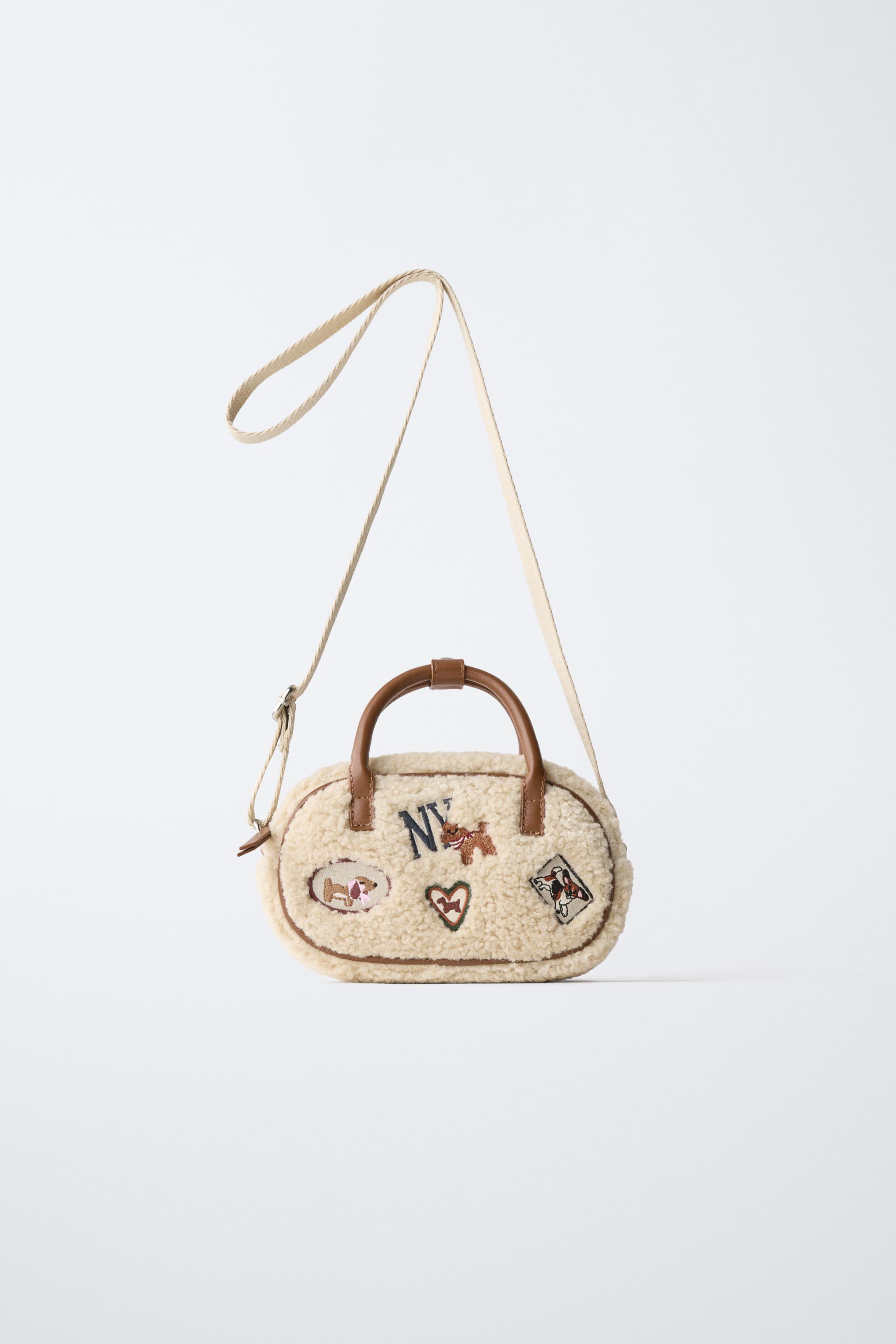 SAC BANDOULIÈRE EN MOUTON RETOURNÉ AVEC PIÈCE