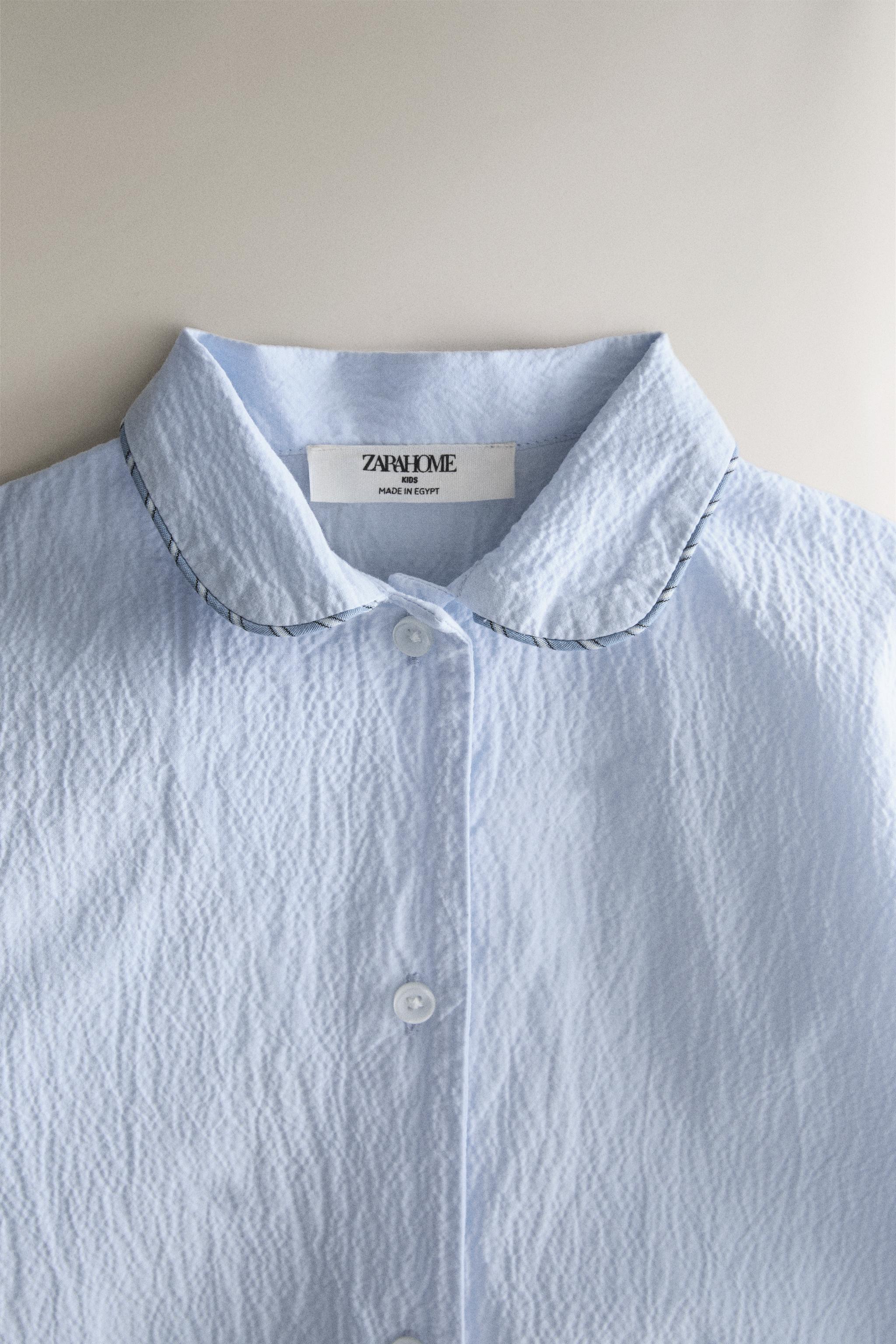 KIDS' SHORT ROMPER — Light blue