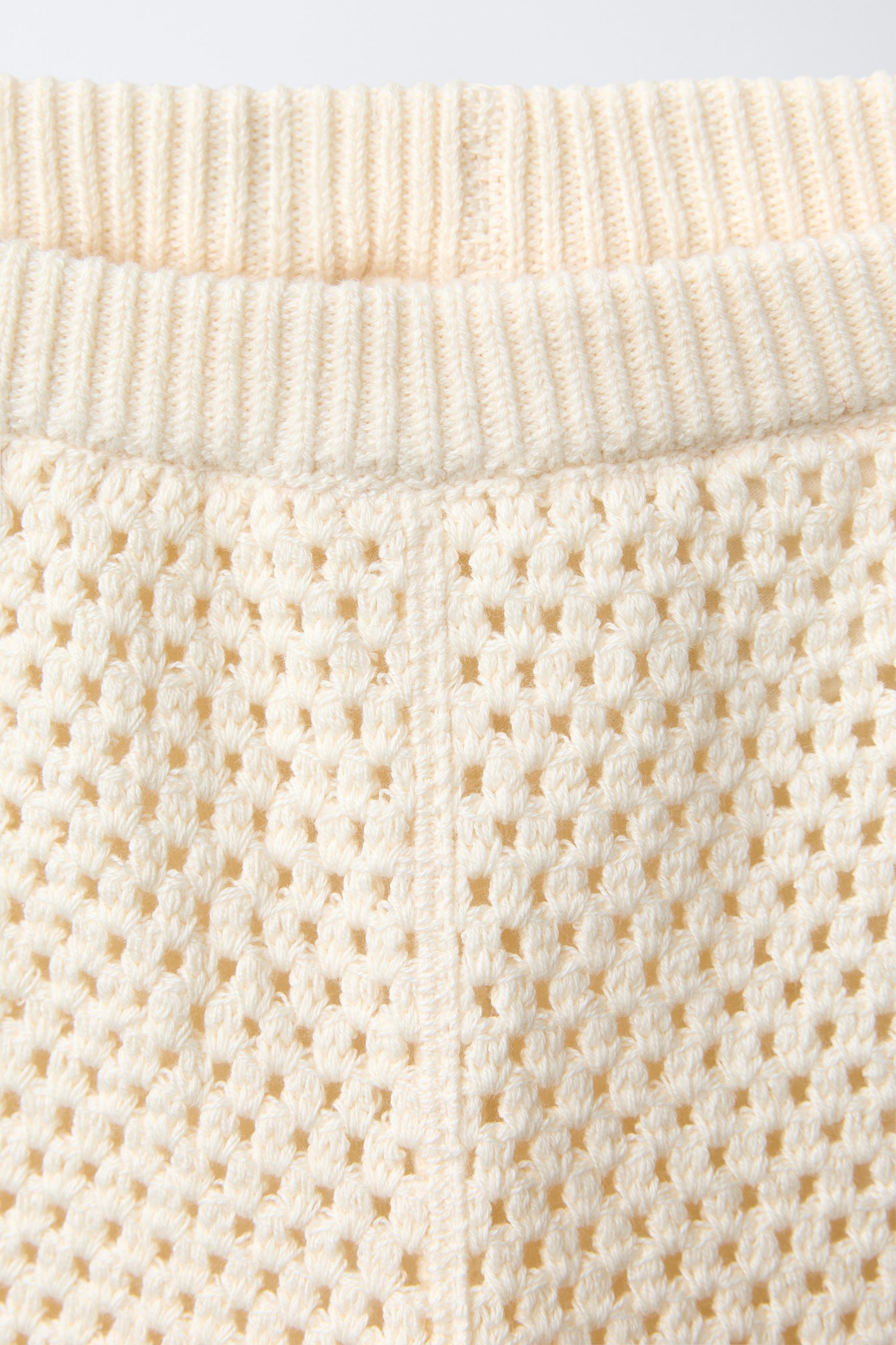 PANTALON JUPE-CULOTTE EN MAILLE CROCHET FLEURS