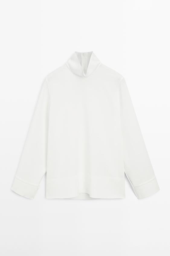 High neck blouse with hem detail from Zara - $130