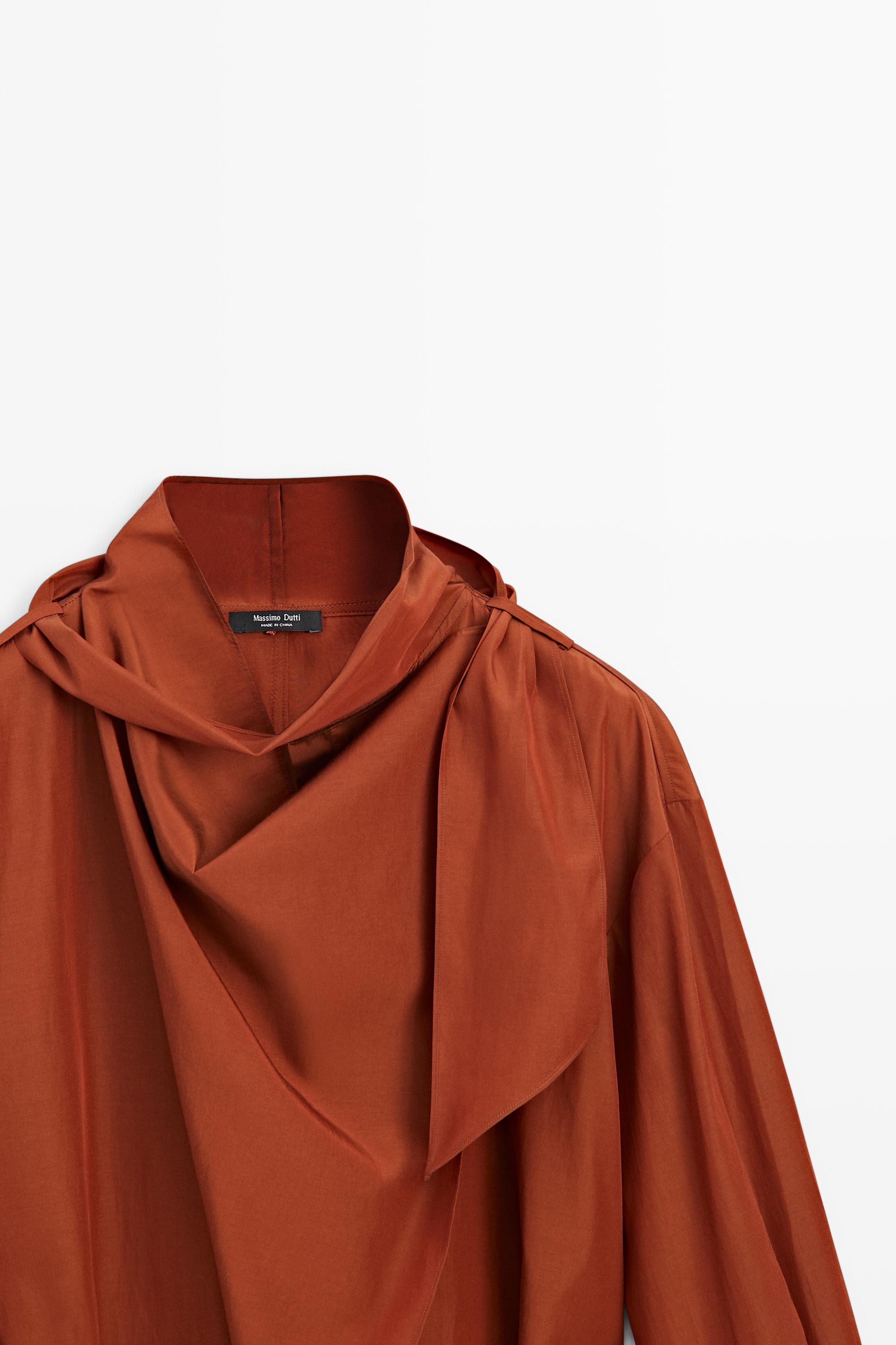 Flowing blouse with tie detail