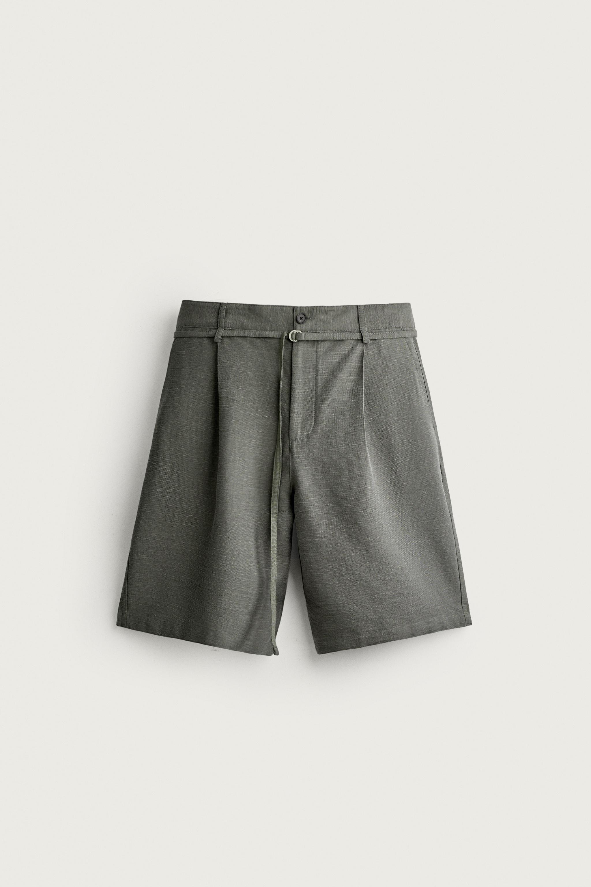 RELAXED FIT PLEATED BELTED SHORTS — Grey green