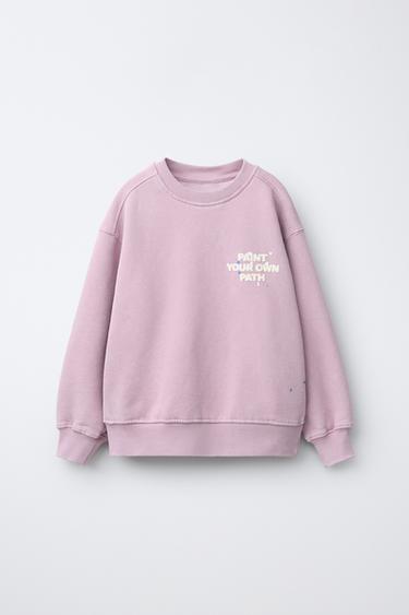 SUDADERA EFECTO LAVADO TEXTO - Rosa pastel de Zara
