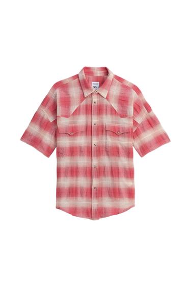 Red and white checked short-sleeved shirt, with chest pockets and front buttons. Visible label with text "ZNA".