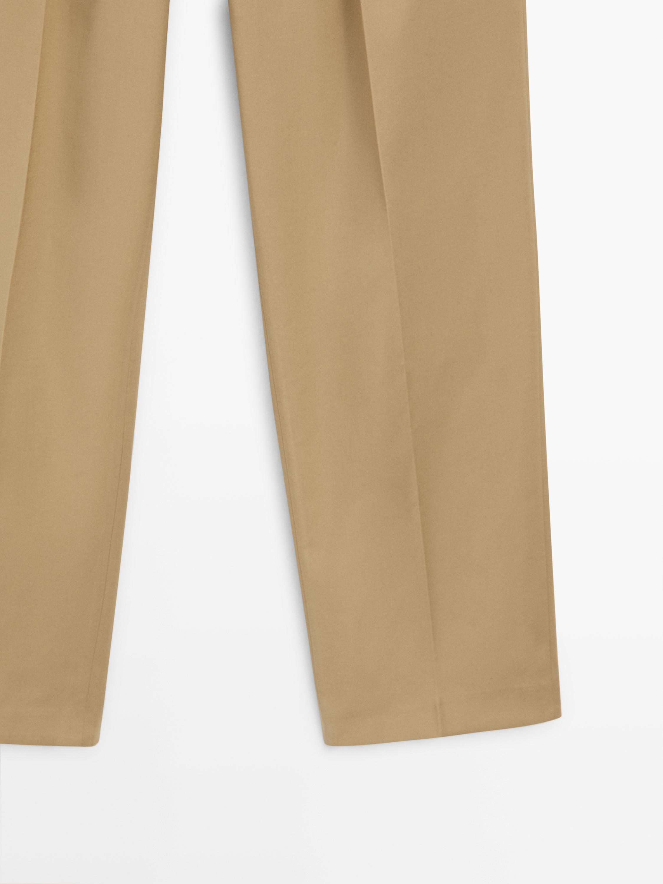 Straight fit pants with pleated details