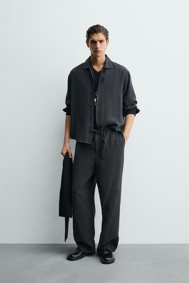 ÁO SƠ MI VẢI RŨ DÁNG SUÔNG - Màu đen từ Zara