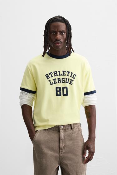 CAMISETA RIB CONTRASTE TEXTO - Amarillo de Zara