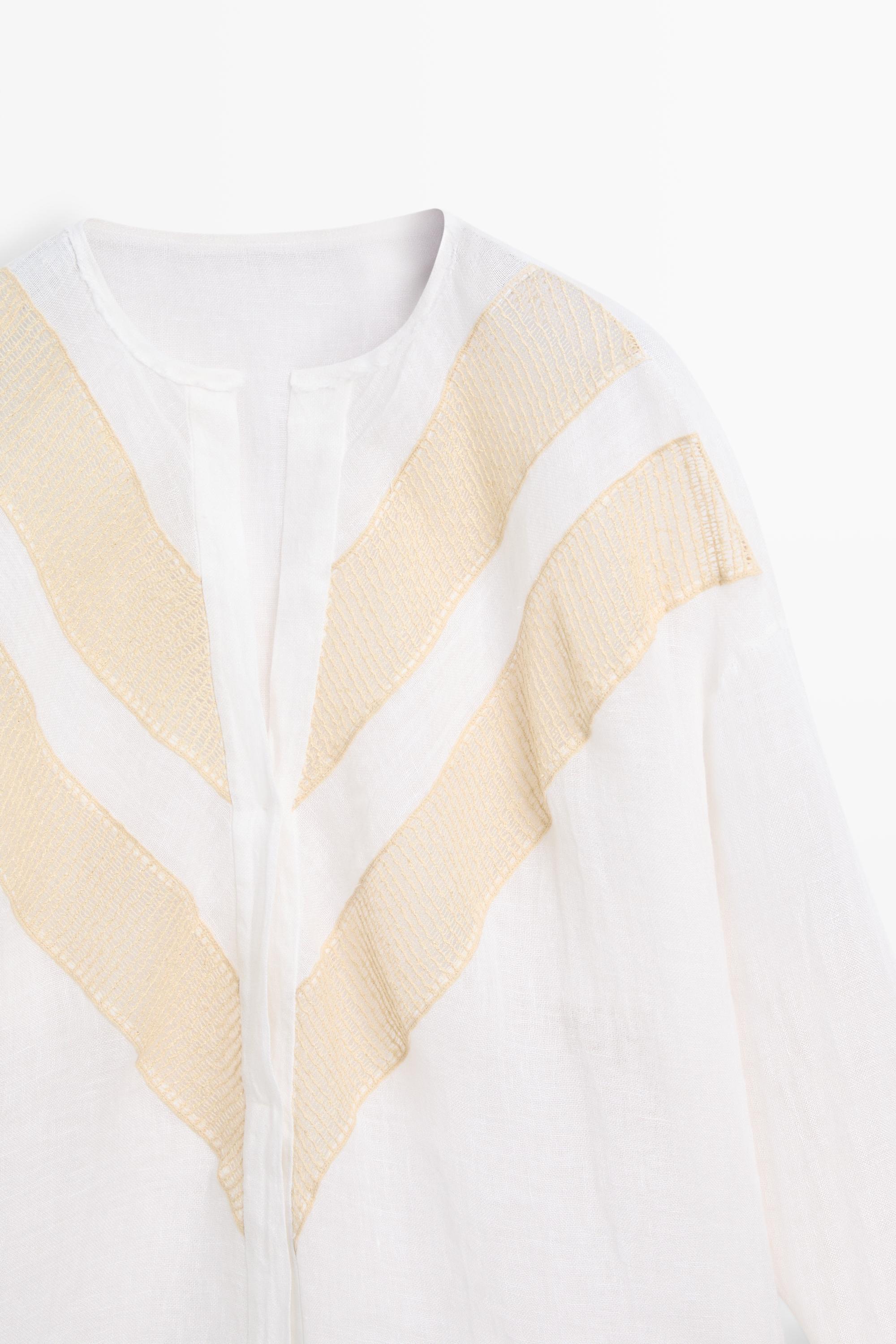 Flowing linen blend shirt with appliqué detail