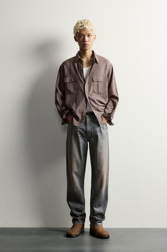 TEXANS REGULAR FIT EFECTE ENCERAT - Blau mitjà de Zara - Imatge 0