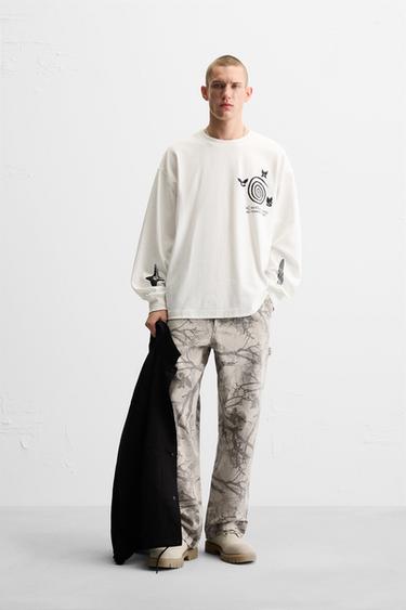 CAMISETA ESTAMPADA X ALL CAPS STUDIO - Blanco roto de Zara - Imagen 0