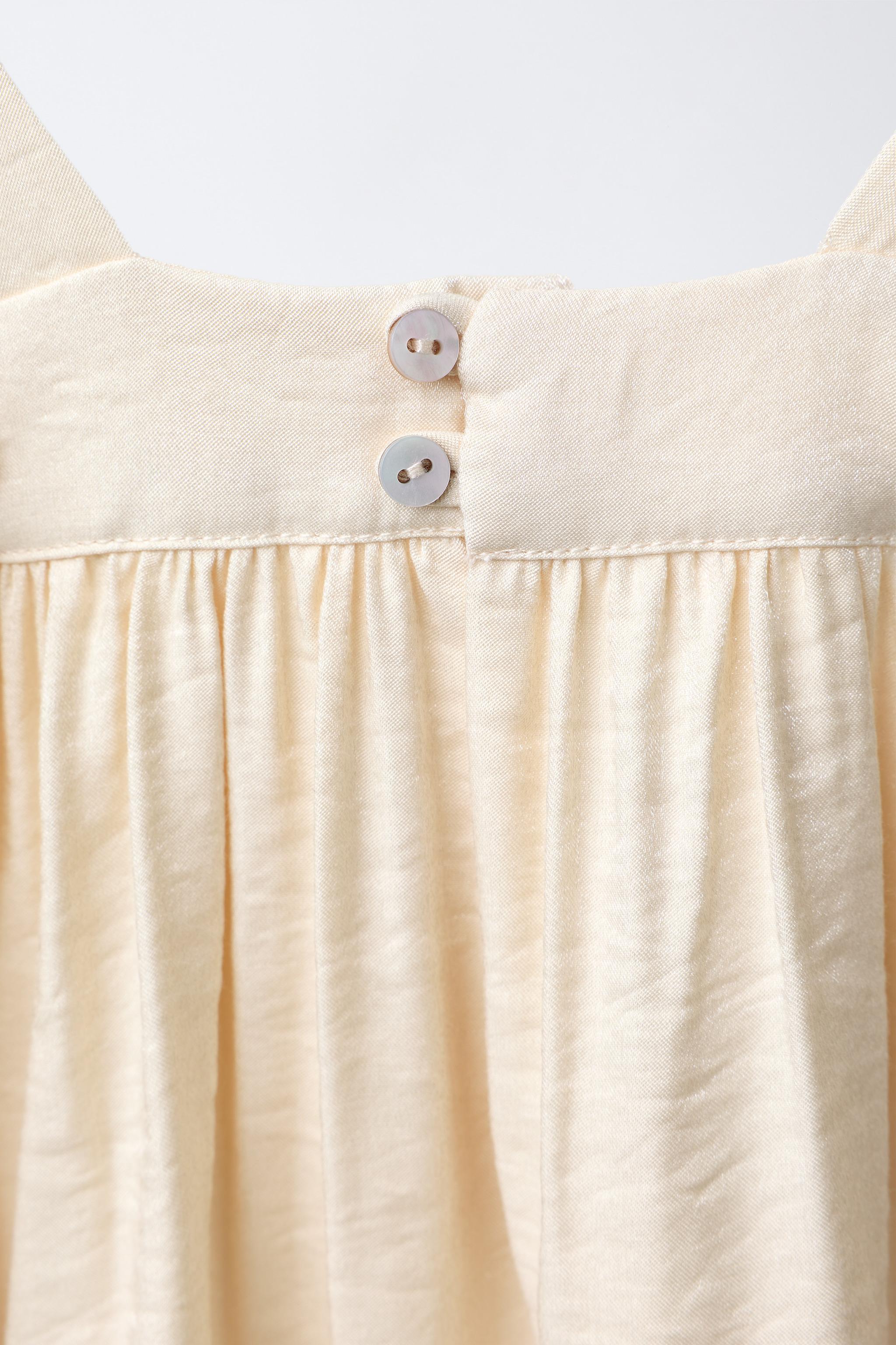 ROBE EN SATIN BRODÉE