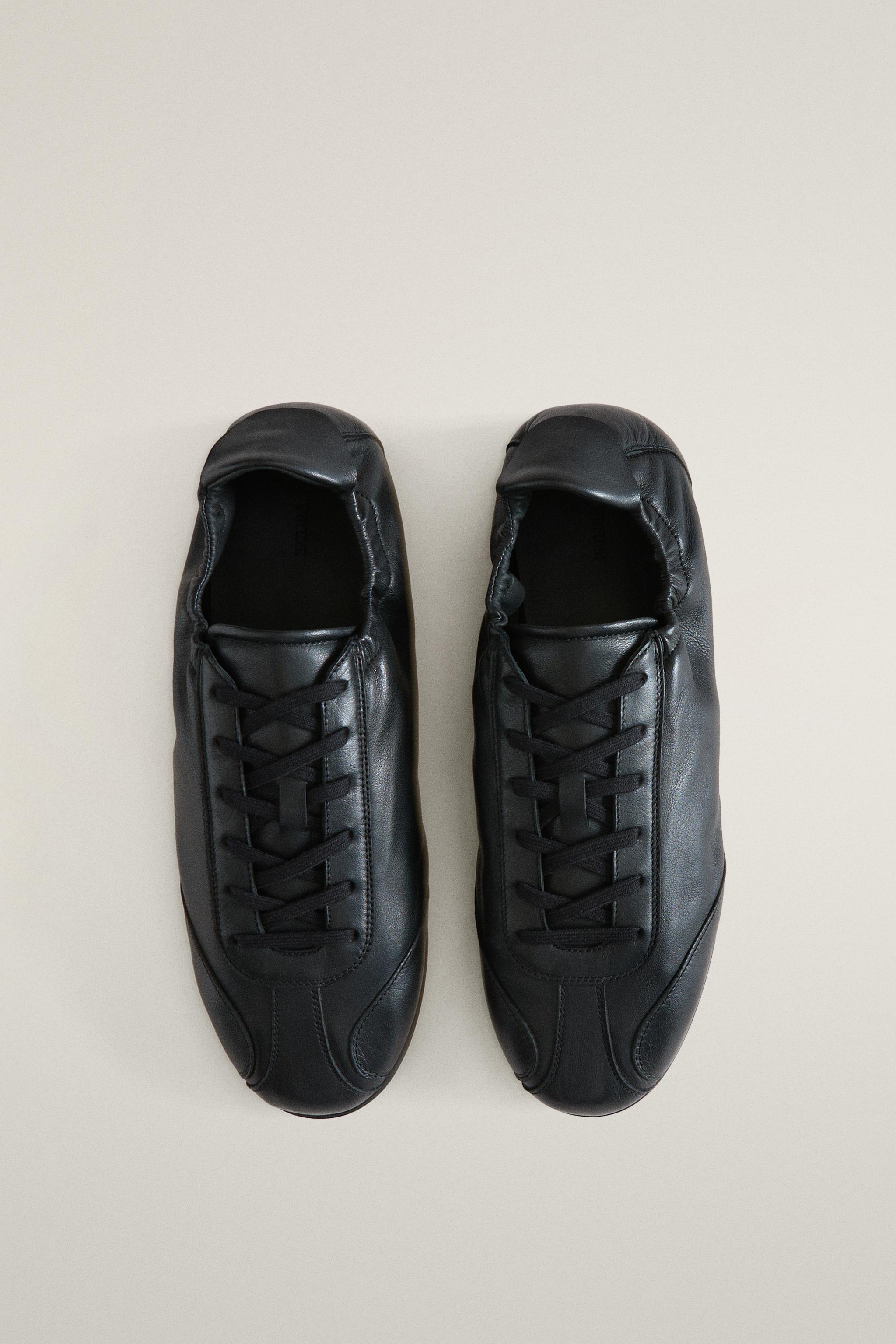CHAUSSONS TENNIS EN CUIR