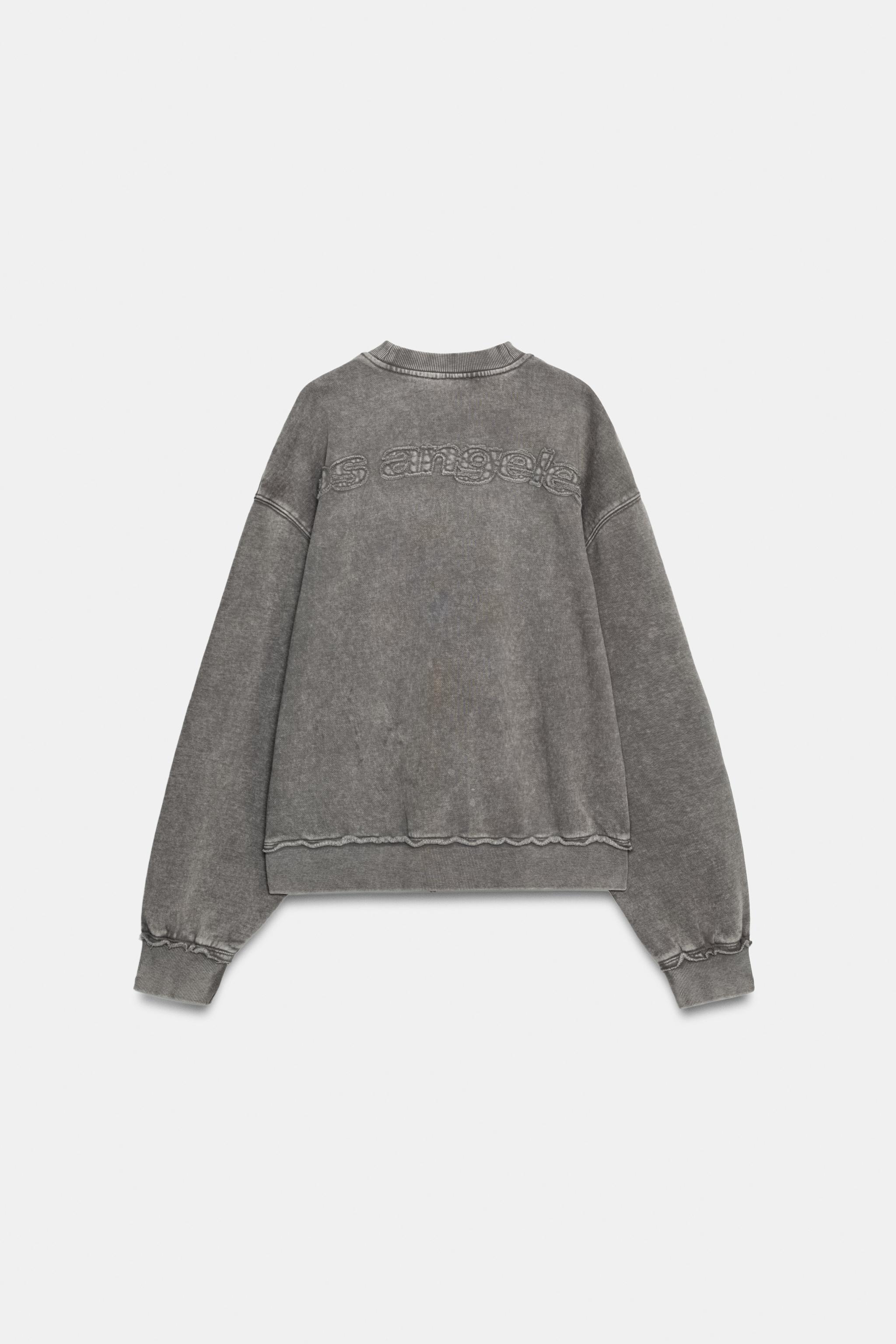 STUDDED EMBROIDERED SWEATSHIRT