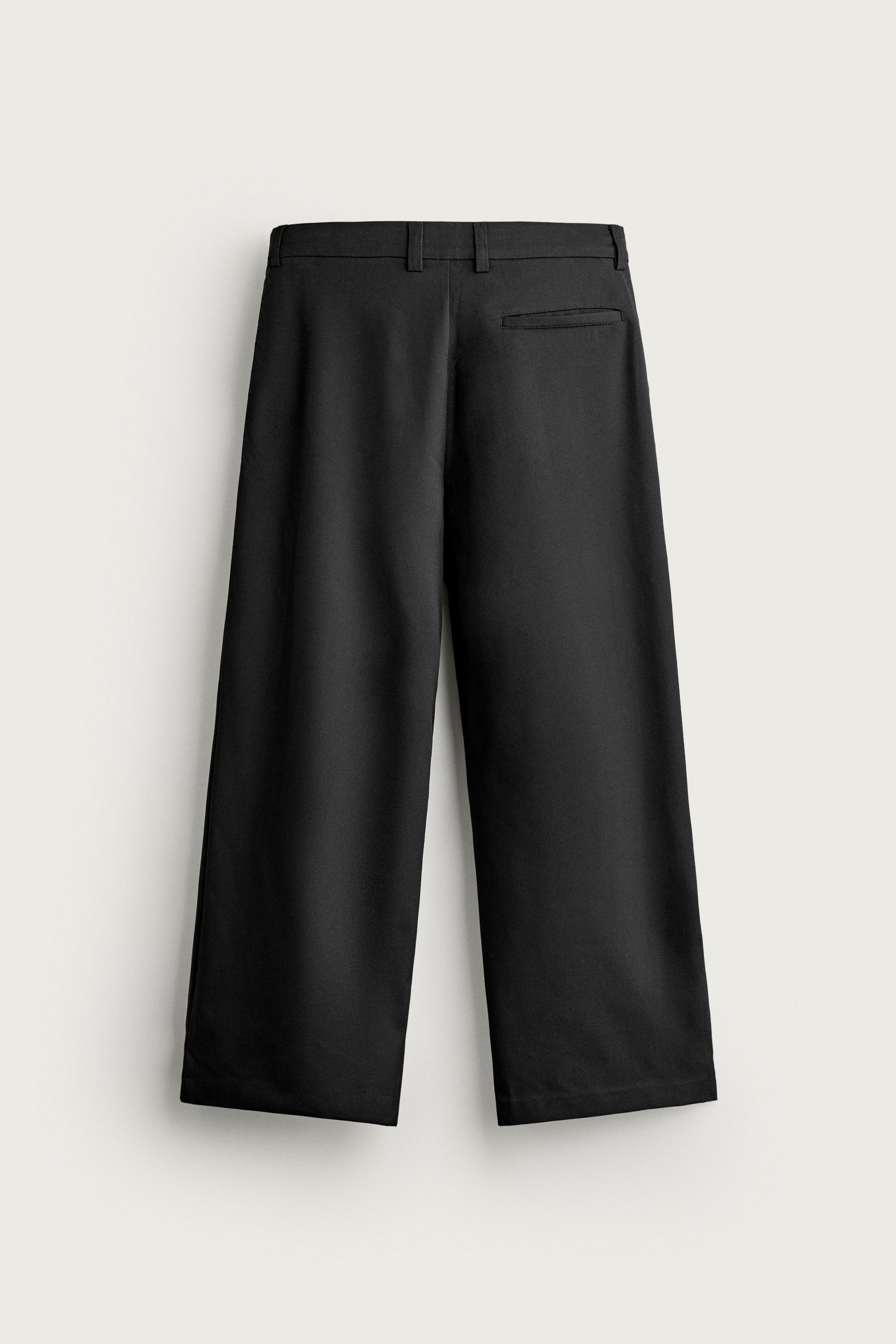 PLEATED RELAXED-FIT PANTS — Black