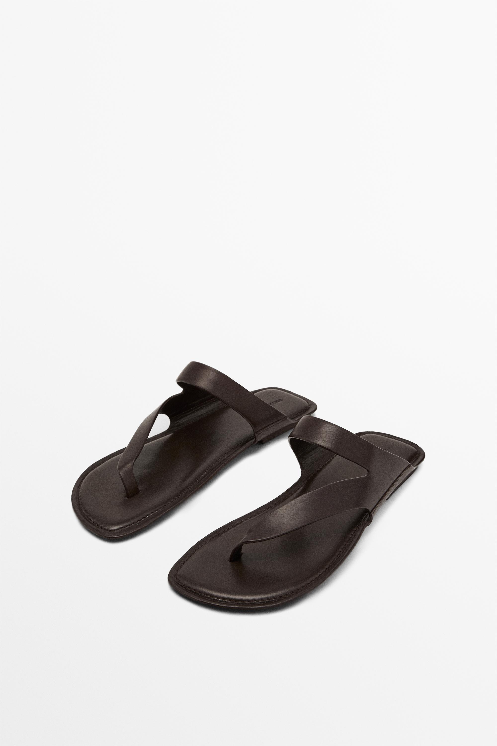 Asymmetric leather sandals with toe divider