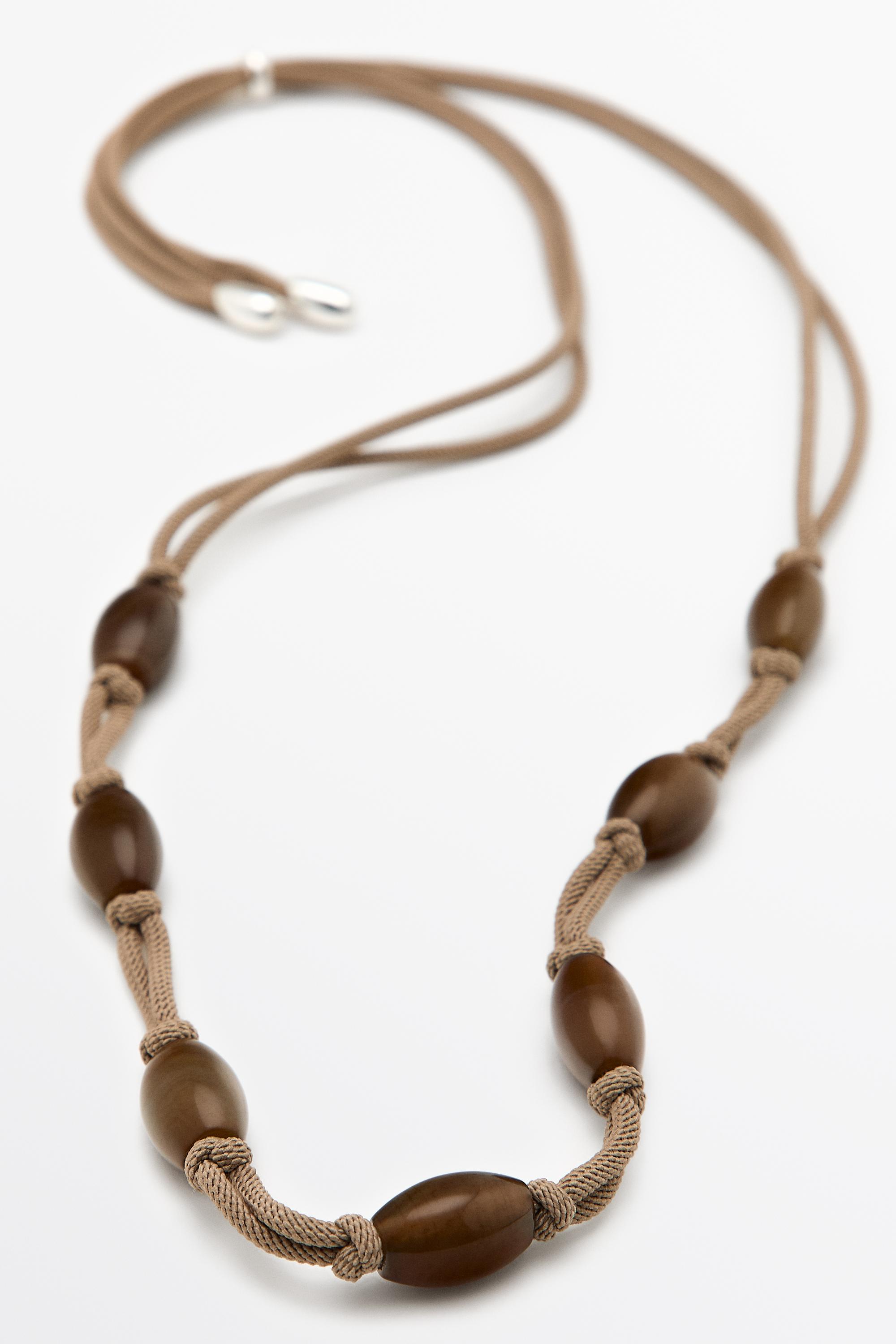 Collier cordon perles gemmes