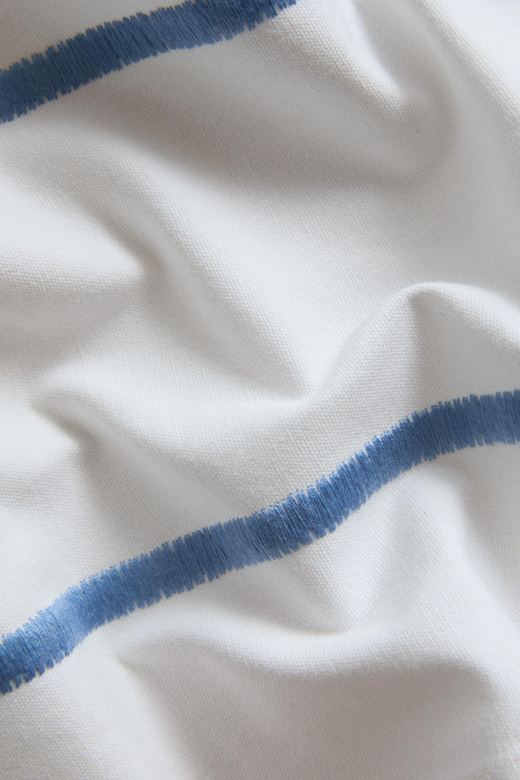 NAPPE RAYURES BRODÉES