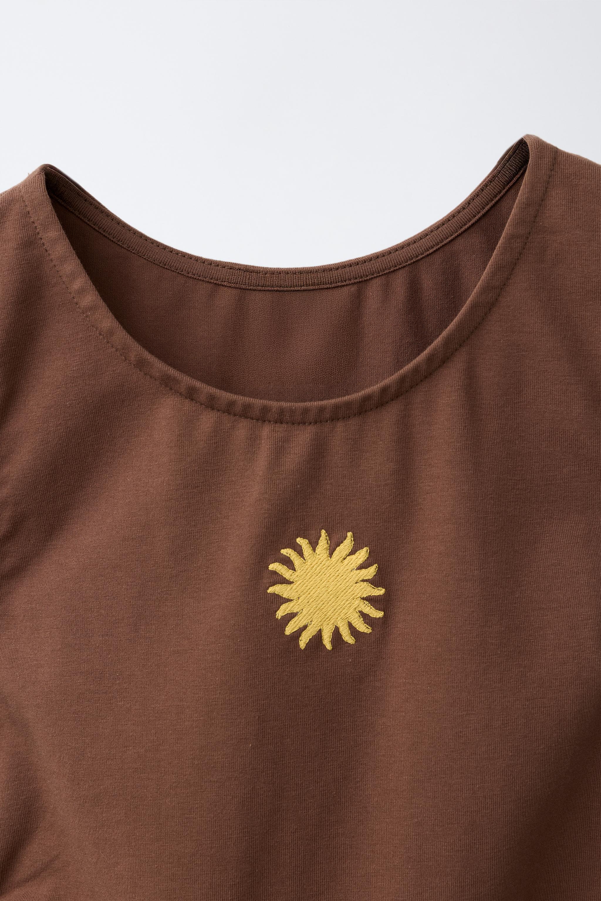 EMBROIDERED CUT-OUT T-SHIRT