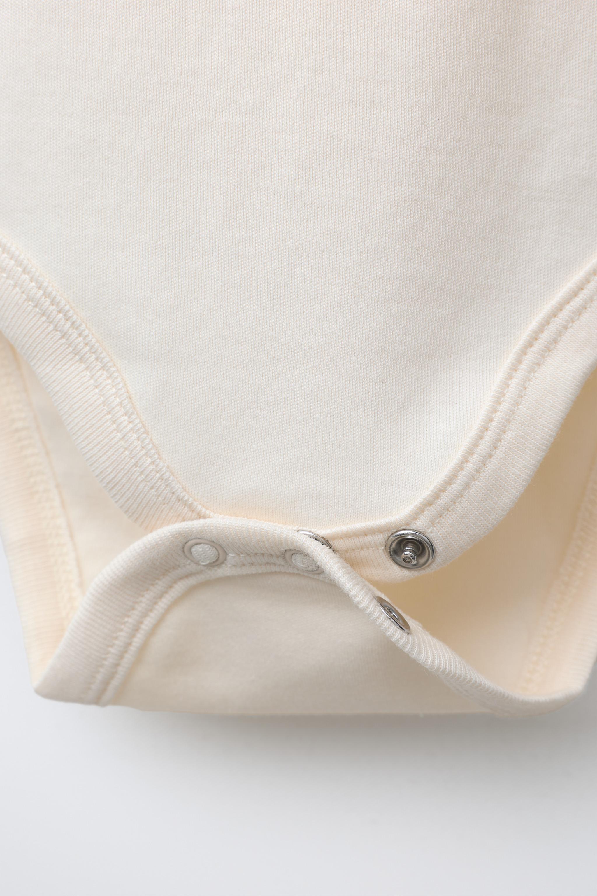 THREE-PACK OF SANTA, REINDEER, AND SNOWMAN BODYSUITS