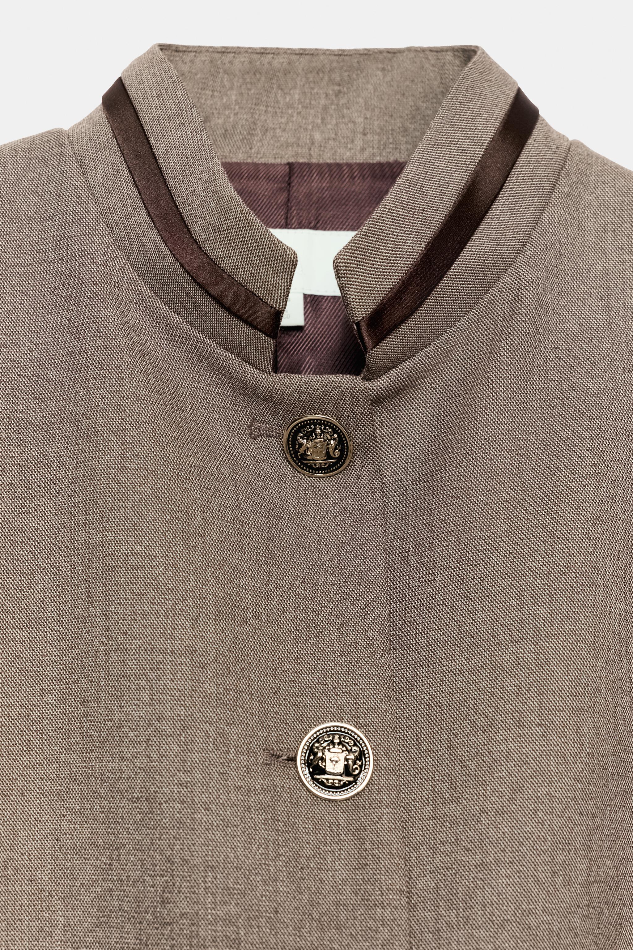 BLAZER PEPLUM À LISERÉS