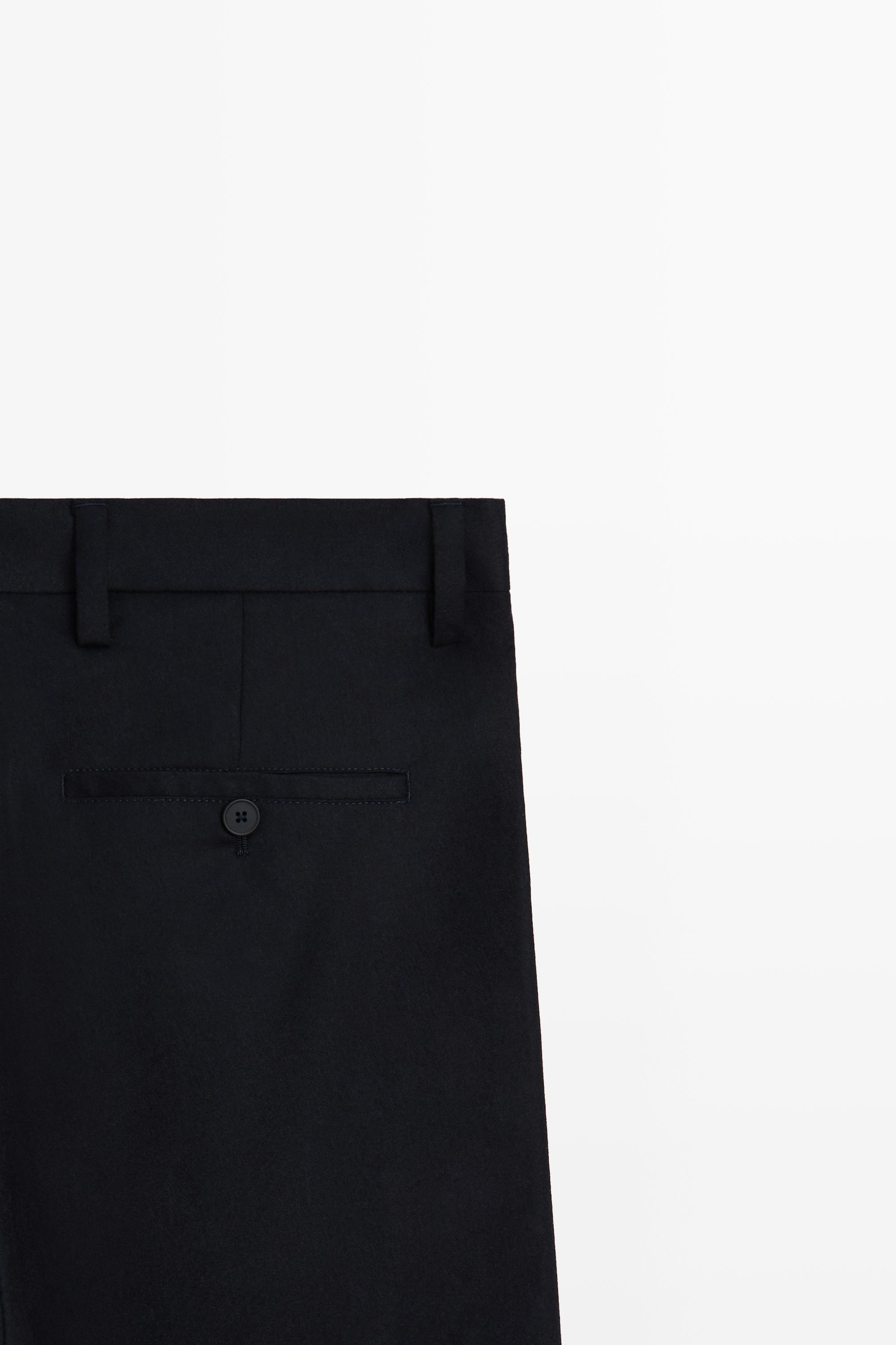 Pantalon tailleur à pinces en flanelle