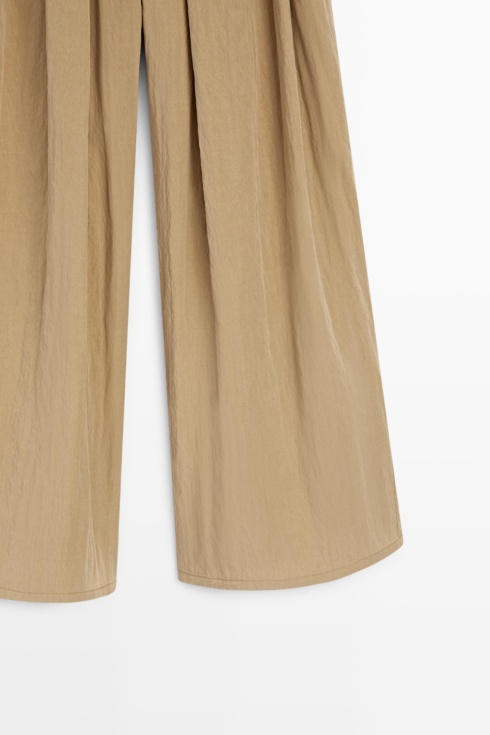 Palazzo trousers with box pleats