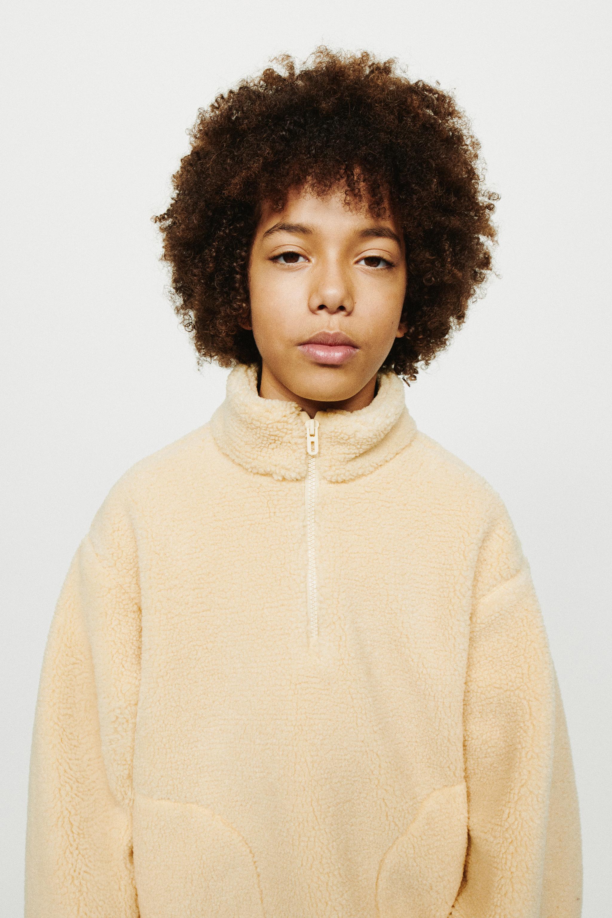 ZIP FAUX SHEARLING SWEATSHIRT