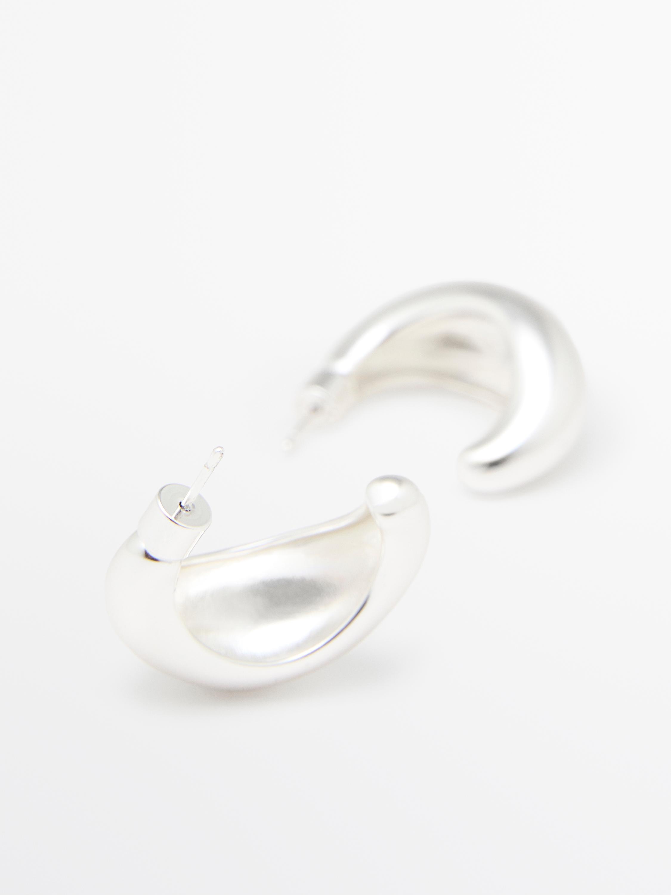 Half-moon hoop earrings