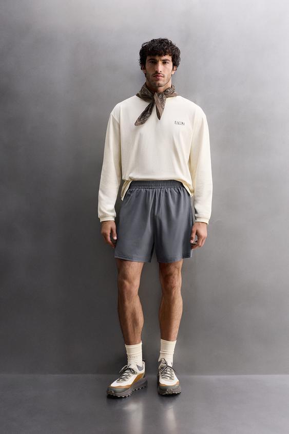 GRAPHIC PRINT TRAINING T-SHIRT