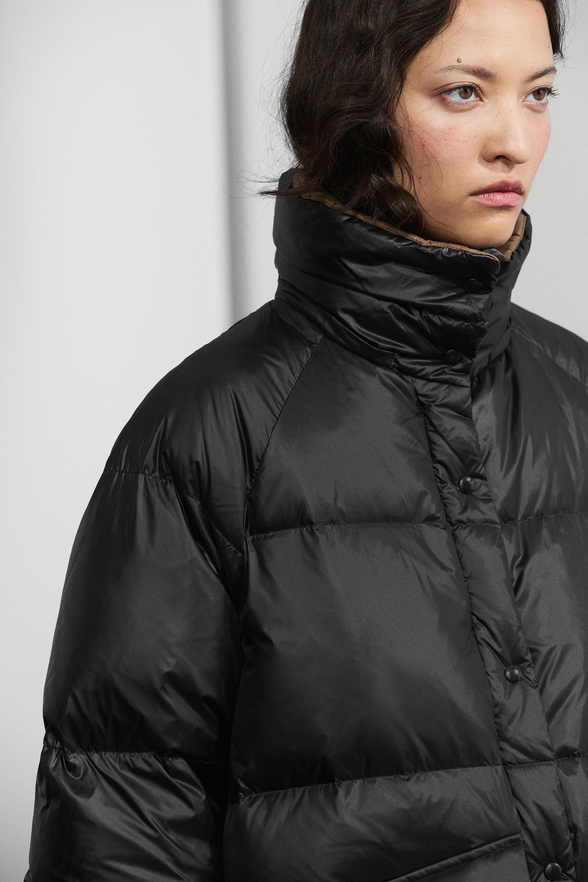 Down jacket with pocket detail