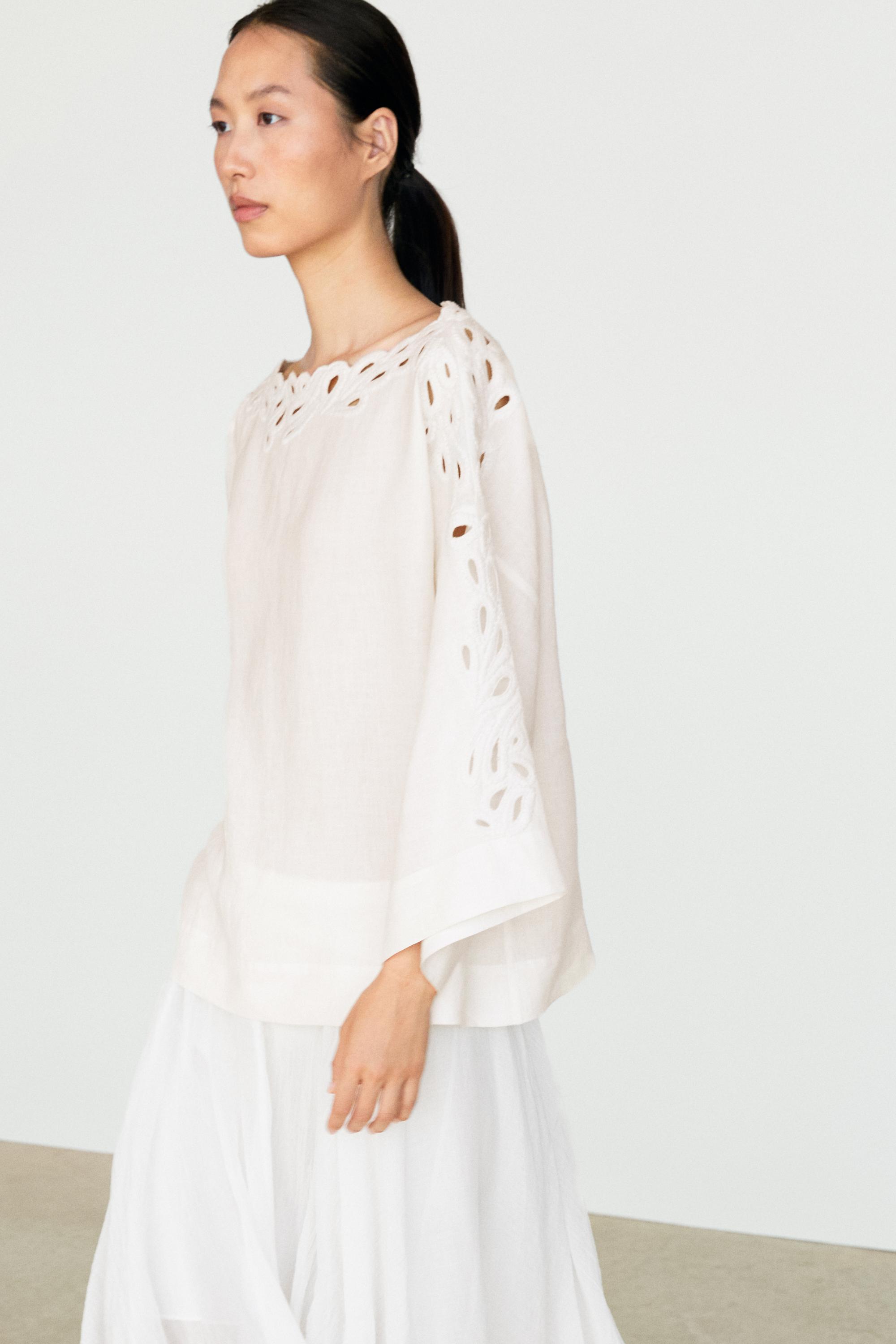Linen boat neck blouse with embroidery