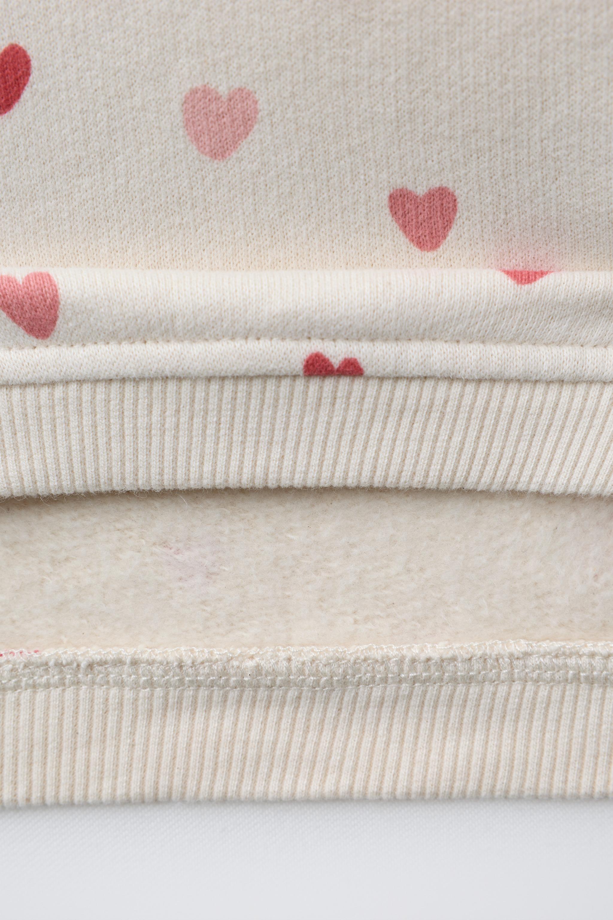 HEARTS SWEATSHIRT