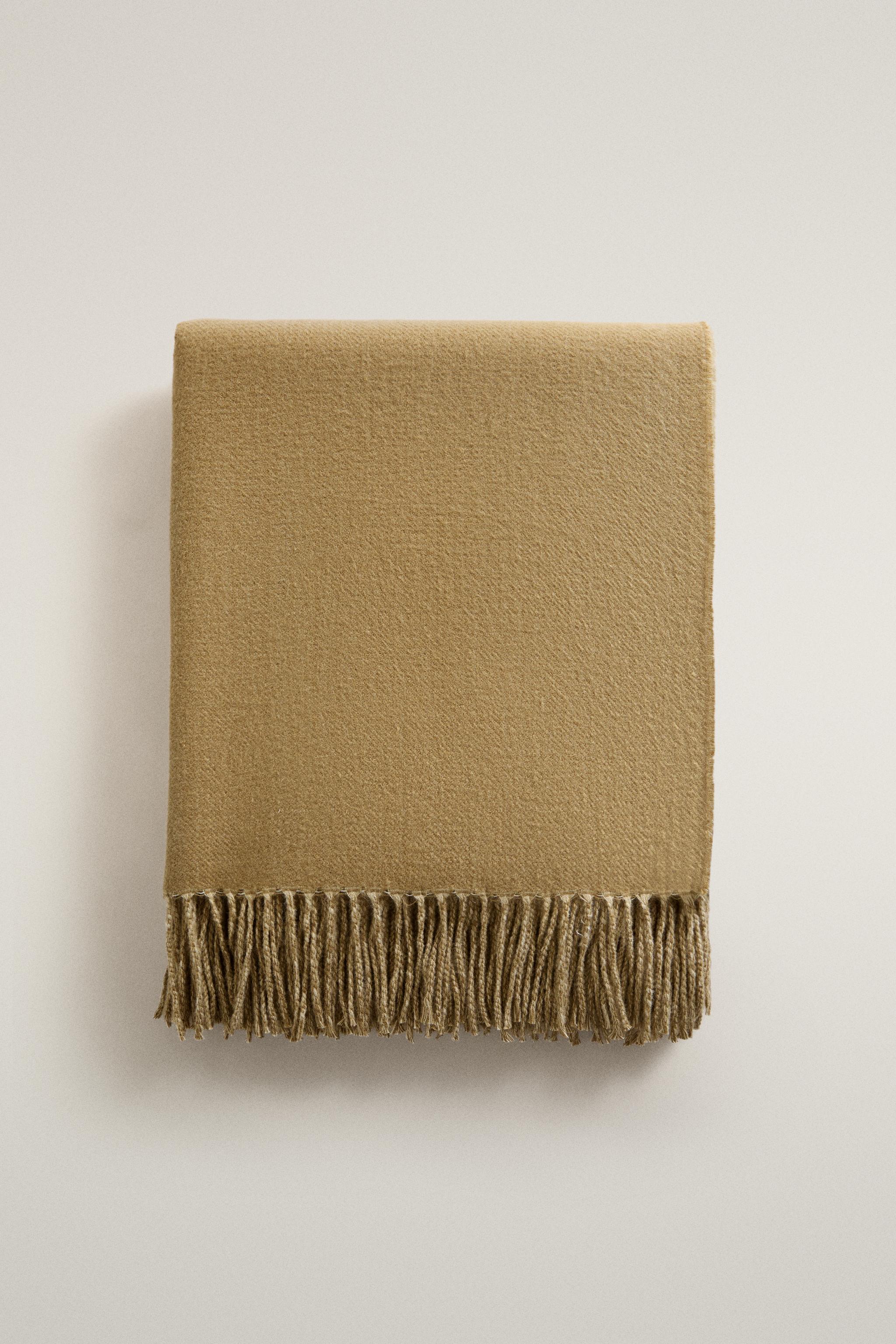 COUVERTURE DOUCE À FRANGES