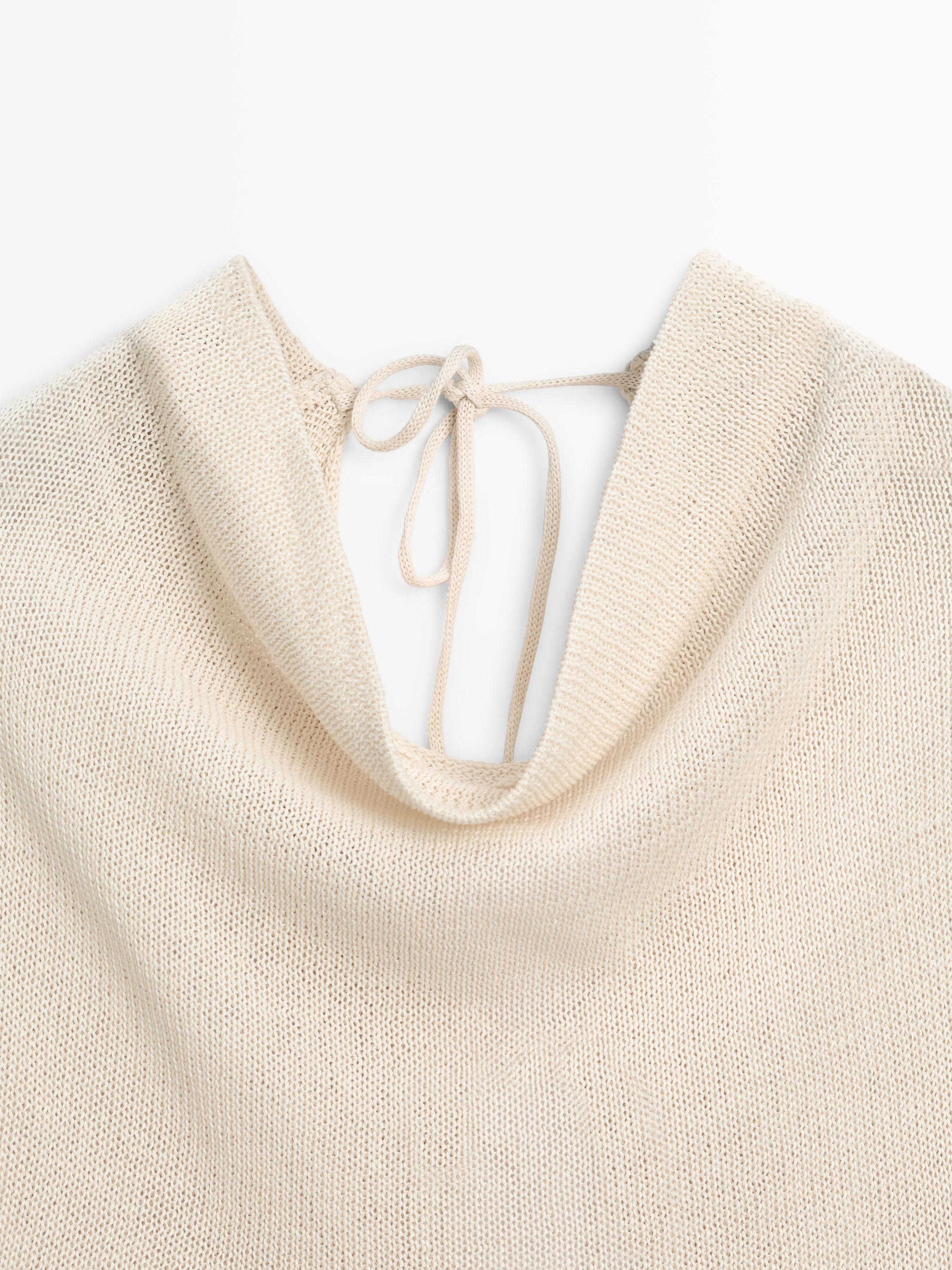 100% cotton knit sweater with back ties