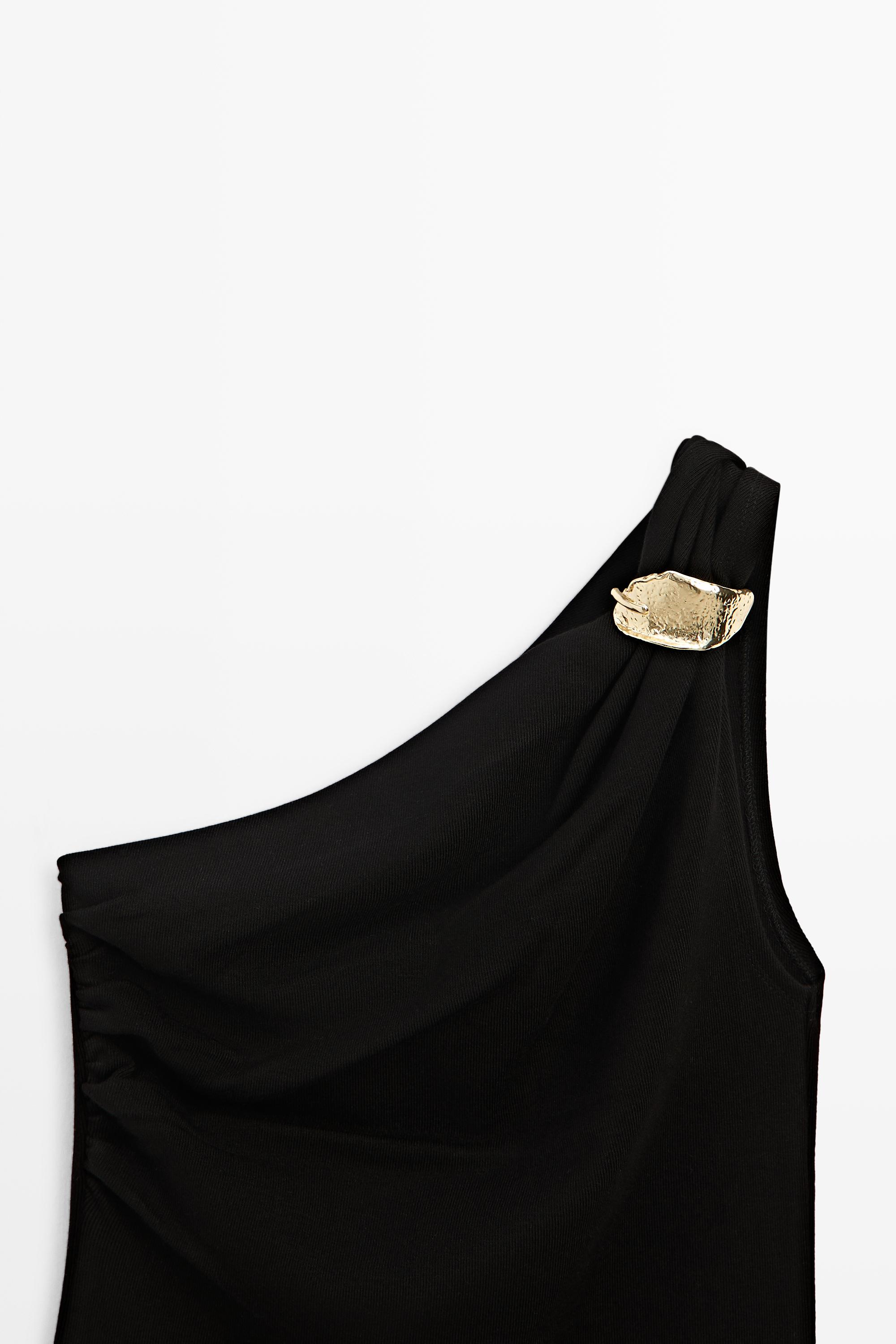 Asymmetric top with metal detail