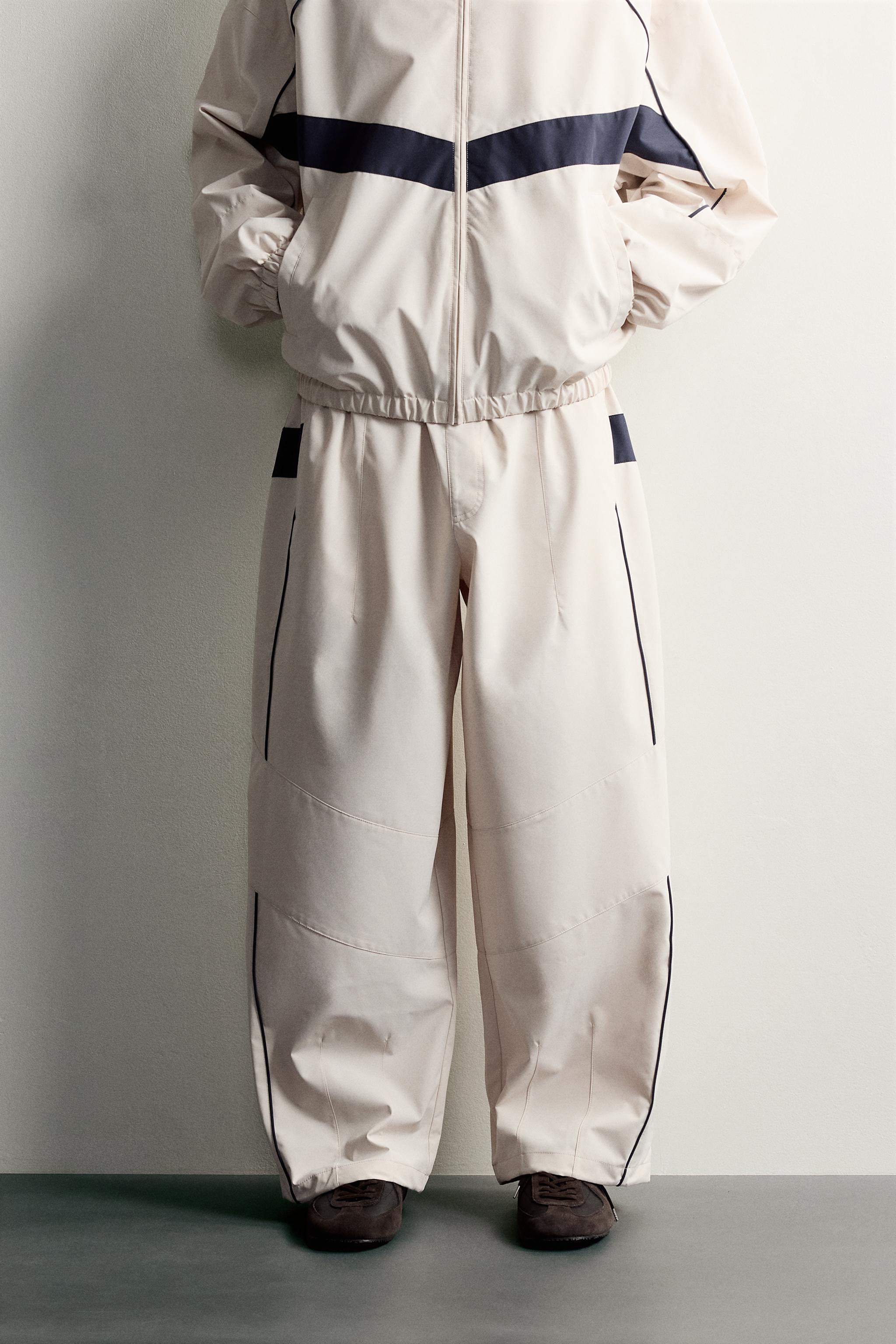 WATER-REPELLENT TECHNICAL CONTRAST TROUSERS — Stone