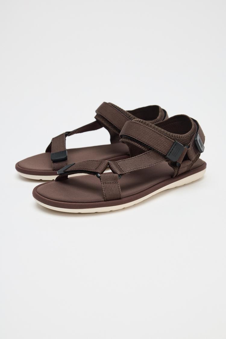 SANDALS WITH ADHESIVE STRAPS