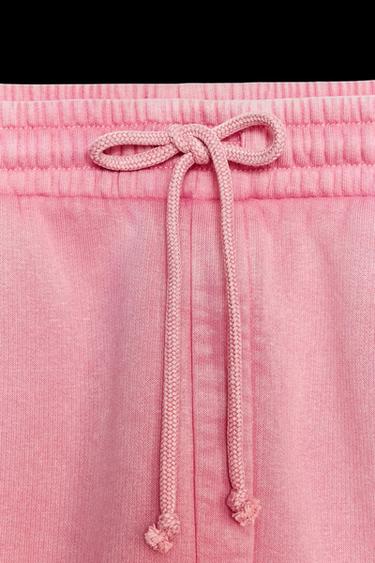 WASHED-EFFECT PLUSH TROUSERS WITH SLOGAN - Pink by Zara