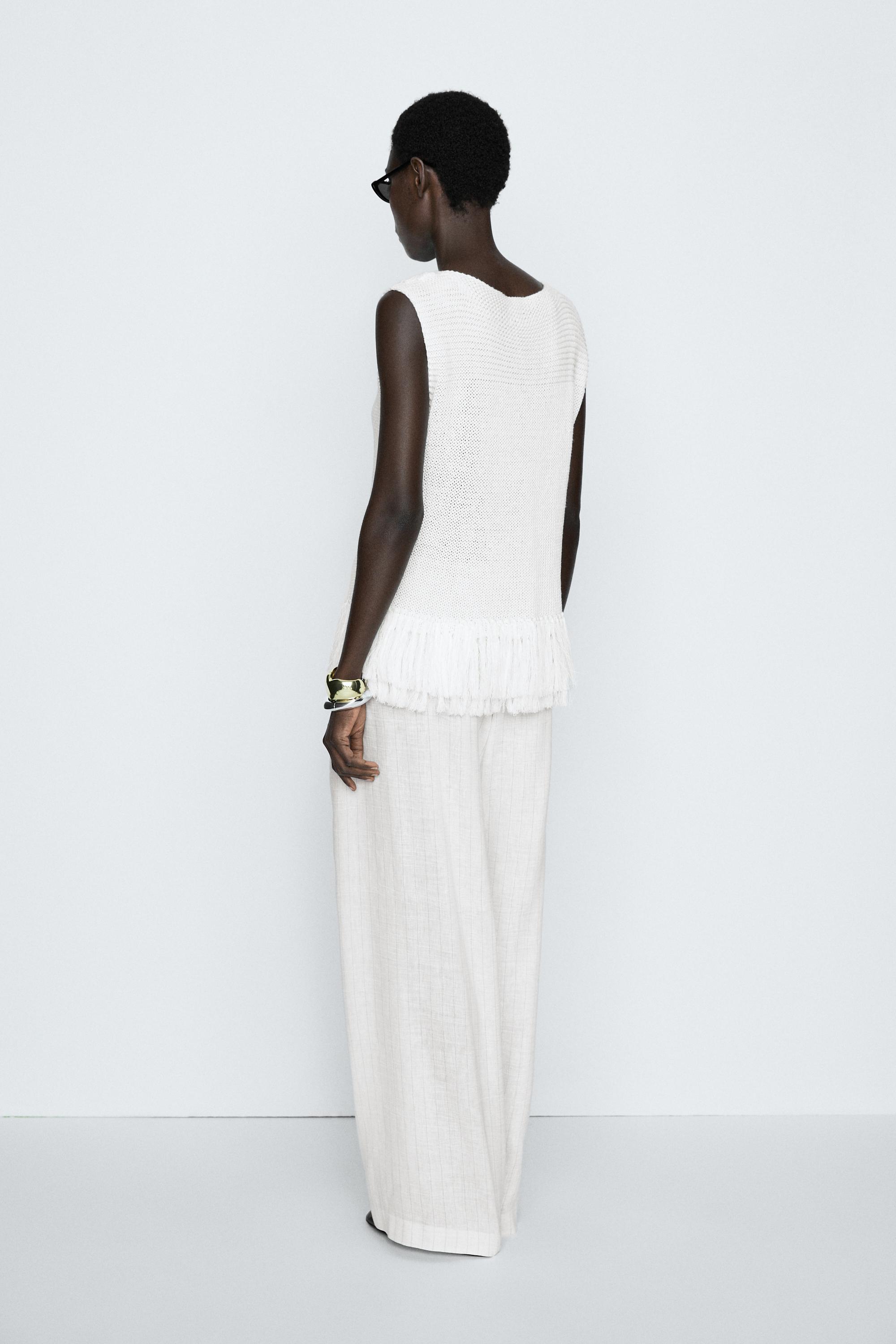 Fringe detail knit top - STUDIO